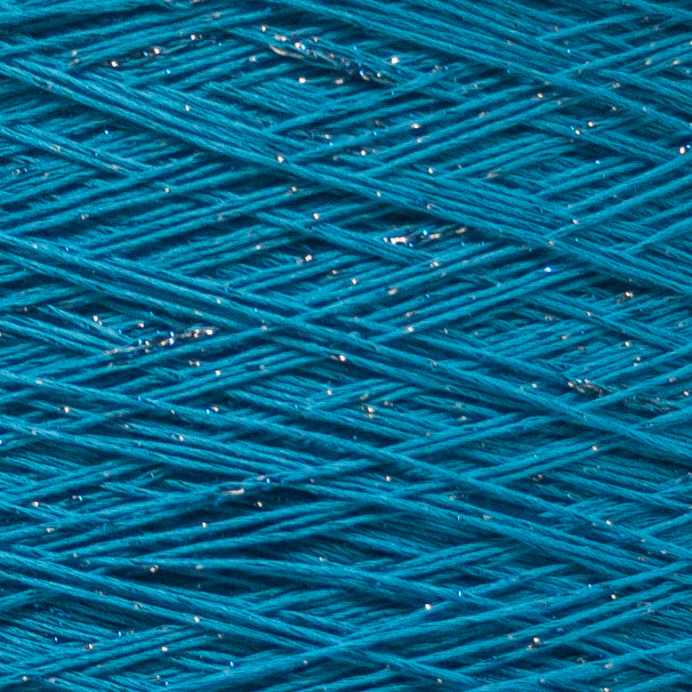Close-up of blue yarn with glittery threads