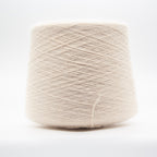 Cone of Angora 70 yarn in Modesto Ivory Mist by Filati Biagioli