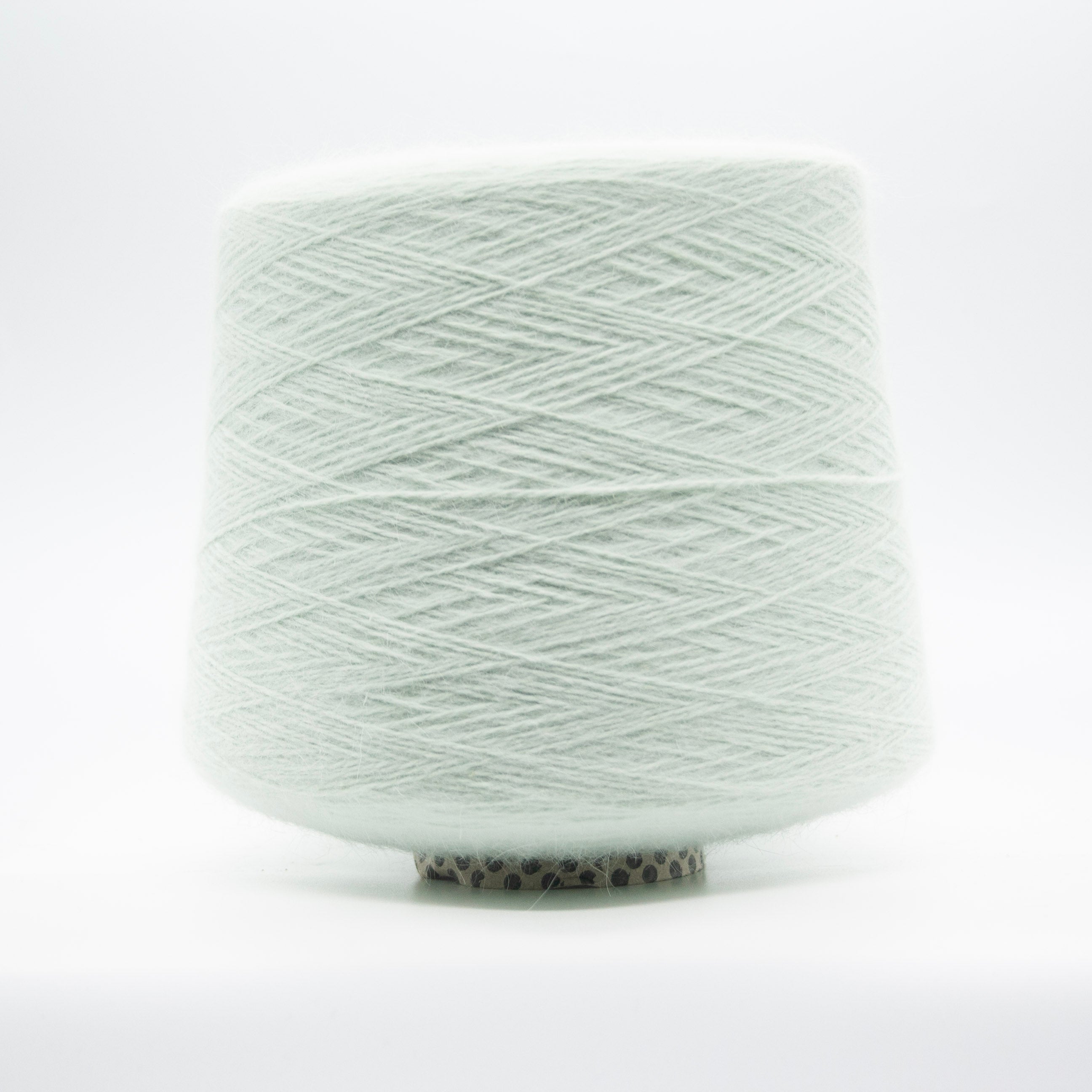 Cone of Angora 70 yarn in Modesto Mint Mist by Filati Biagioli