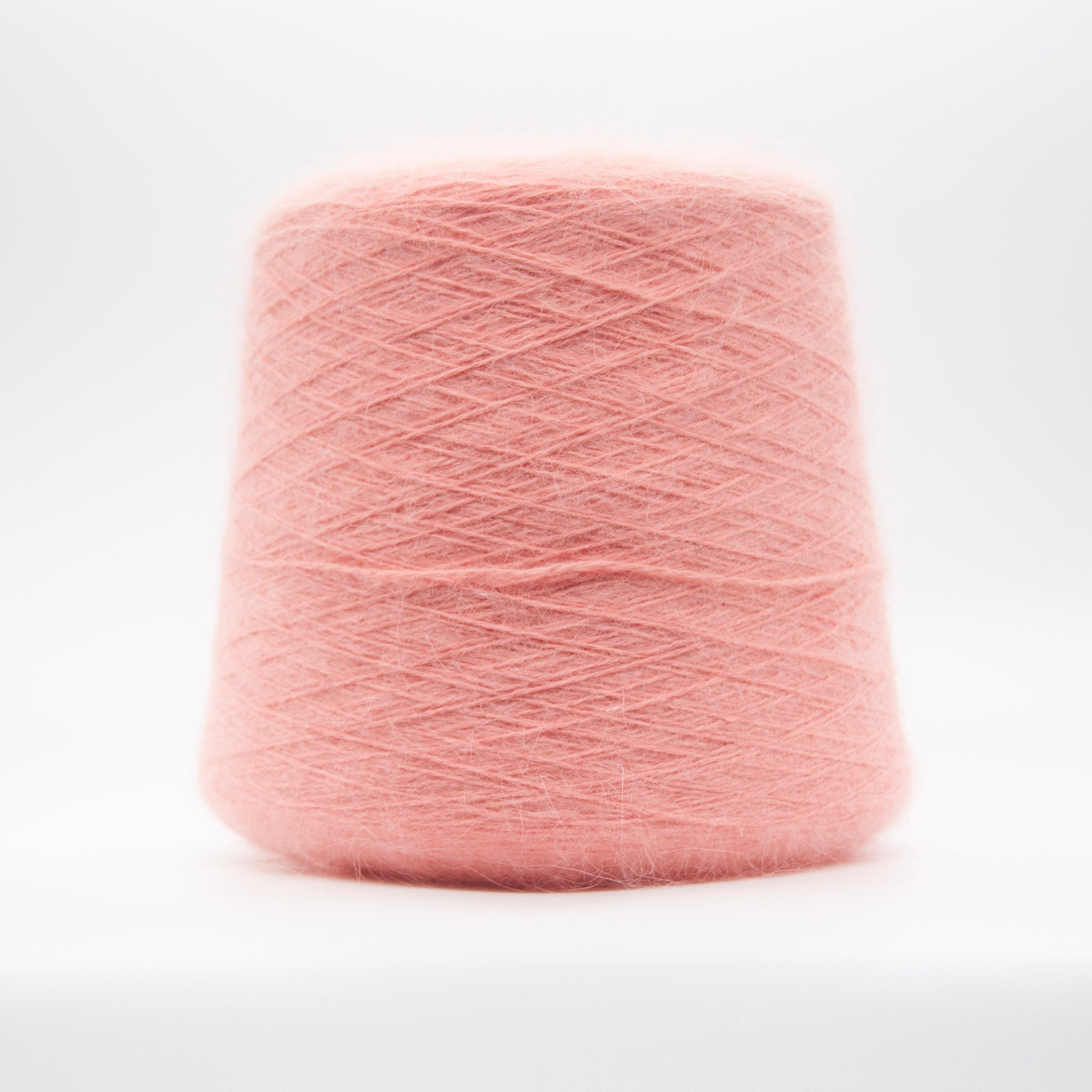 Cone of Angora 70 yarn in Modesto Rose Mist by Filati Biagioli