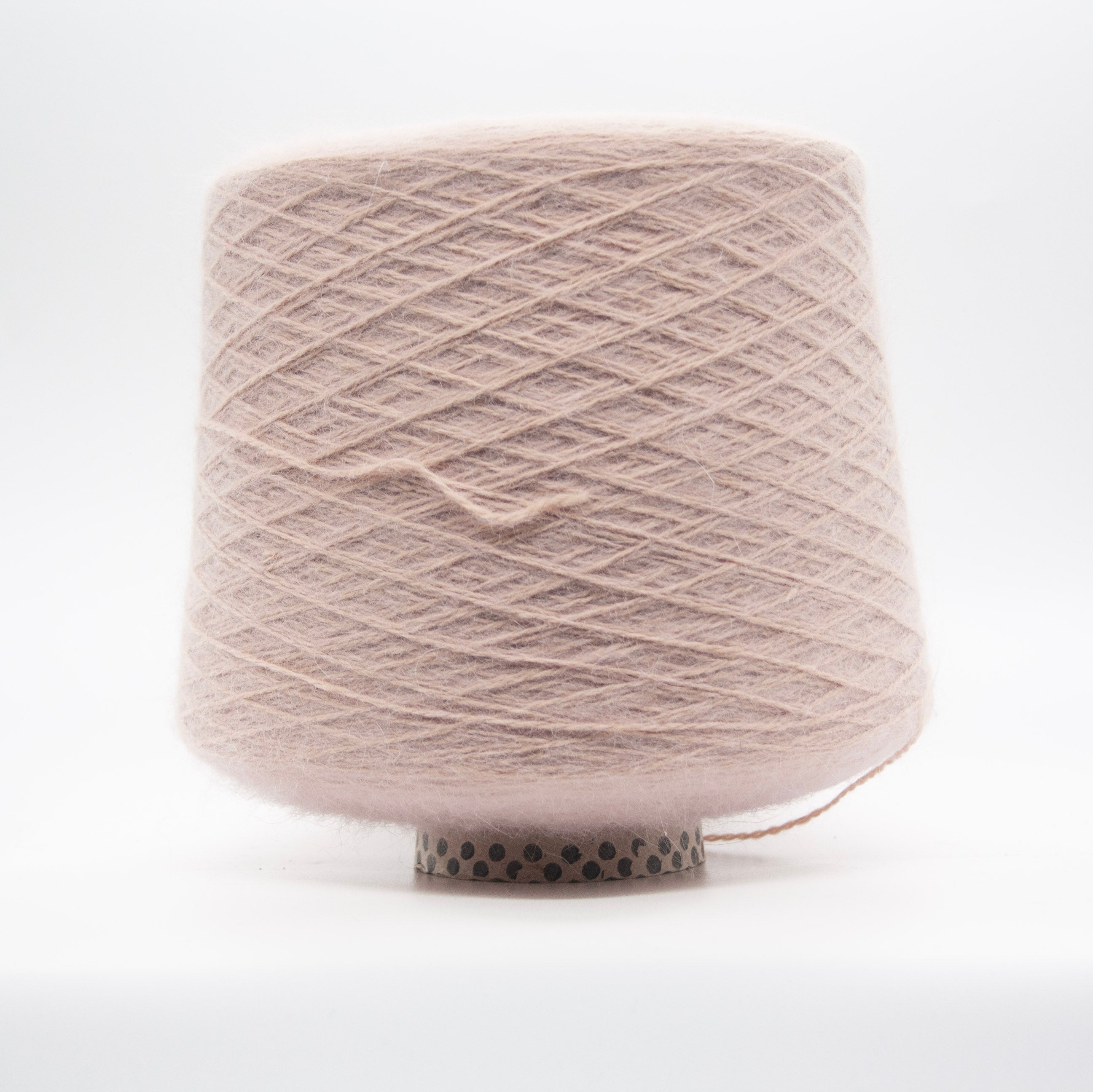 Cone of Angora 70 yarn in Modesto Sand Mist by Filati Biagioli