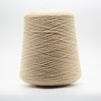 Cone of Baby Cashmere Atelier yarn in Vapor Paraffi by Loro Piana