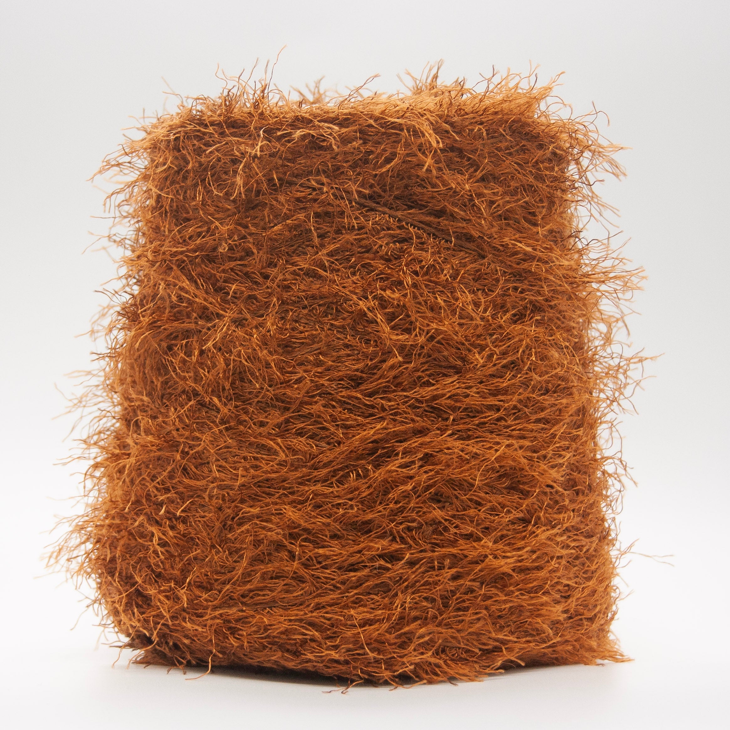 Cone of Bizzare yarn in Copper by Cariaggi Burnt