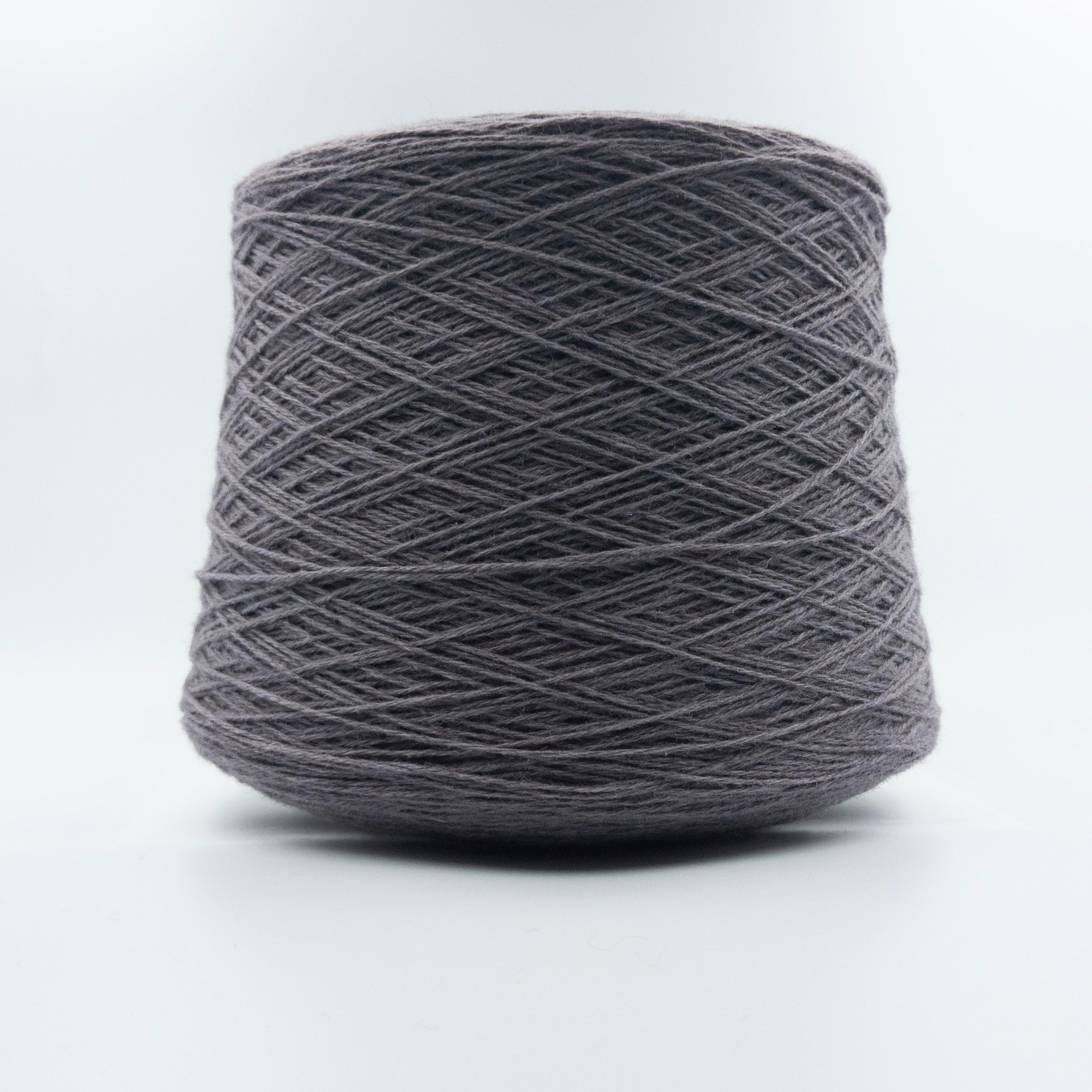 Cone of Cashan Brown yarn in Dusty Mauve by Filati Venezia
