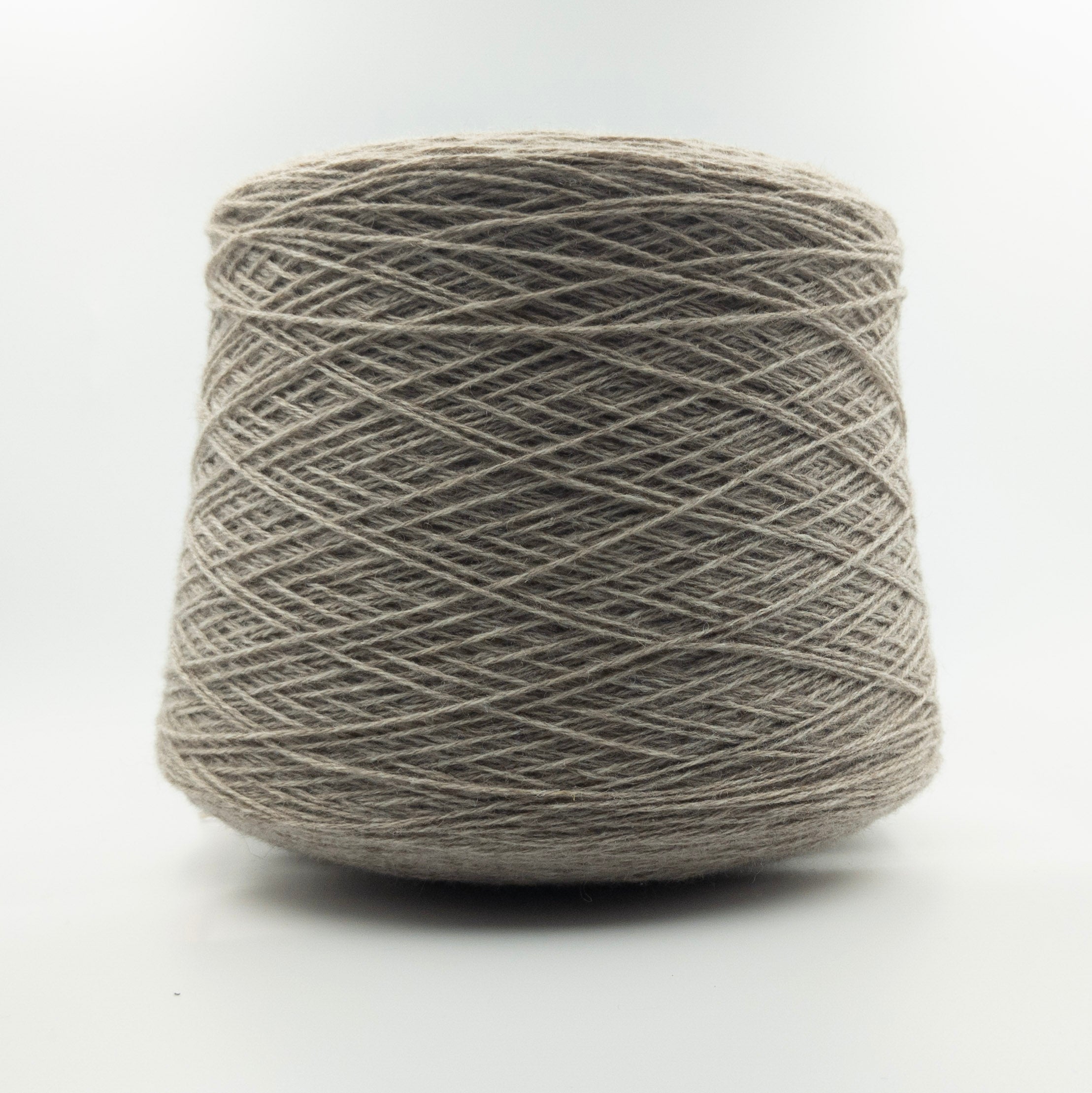 Cone of Cashan Brown yarn in Oatmeal Beige by Filati Venezia