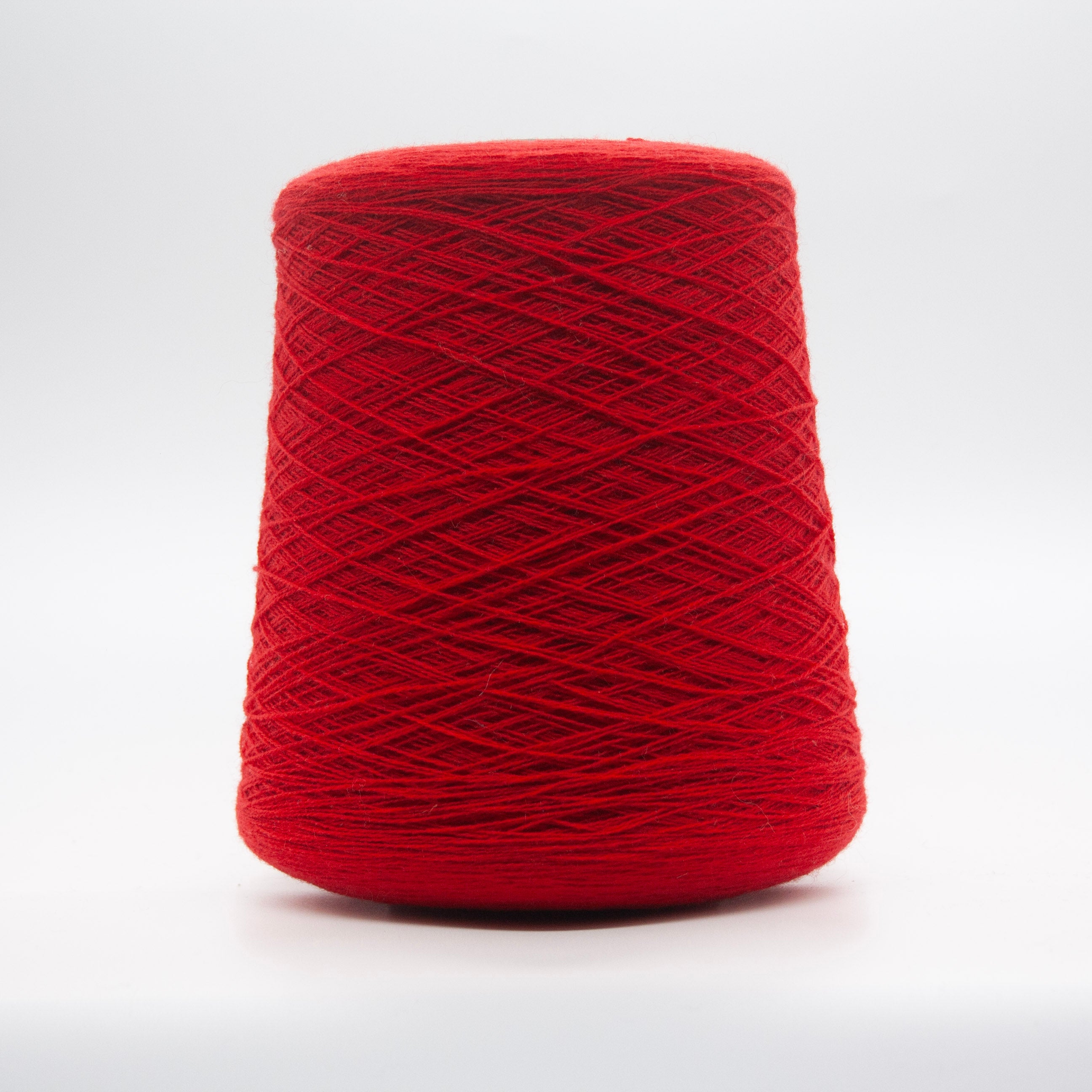 Cone of Cashmere Heritage yarn in Cardinal by Todd Duncan