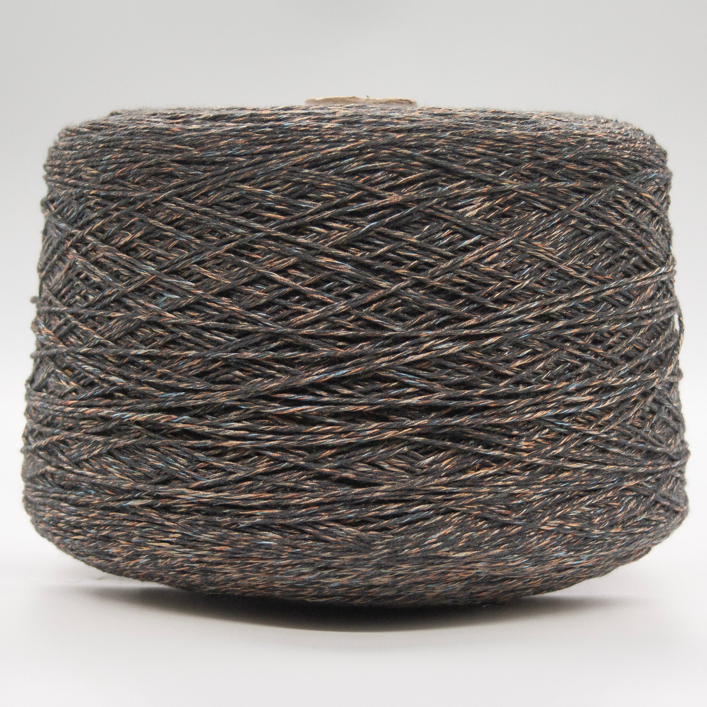 Cone of Cotton Gold yarn in Charcoal Gold by Filati Venezia