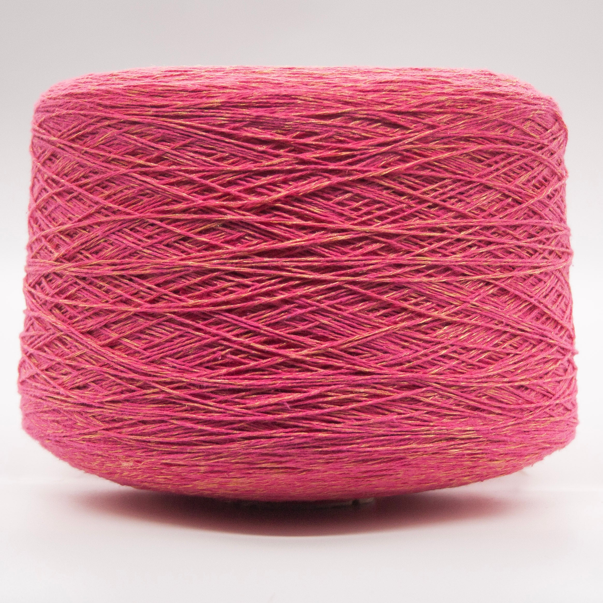 Cone of Cotton Gold yarn in Fuchsia Gold by Filati Venezia