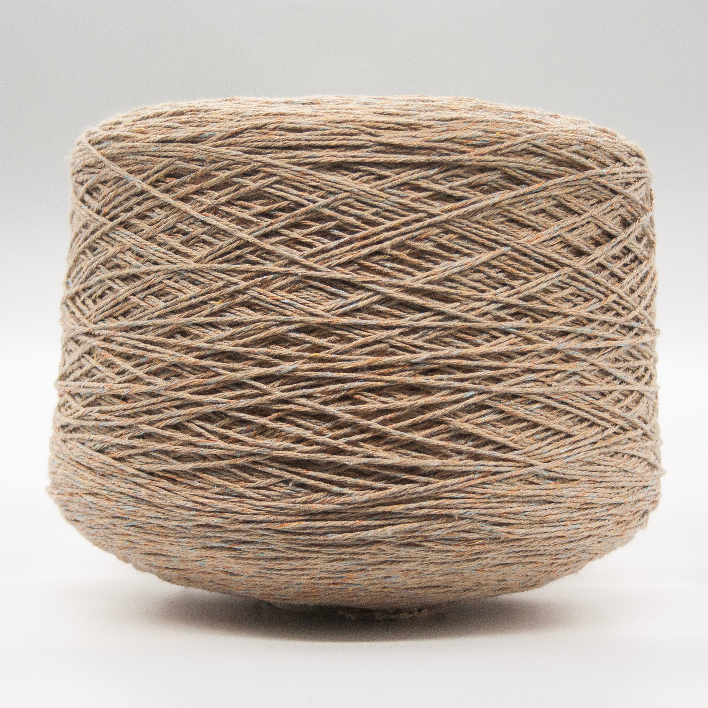 Cone of Cotton Gold yarn in Oatmeal Gold by Filati Venezia