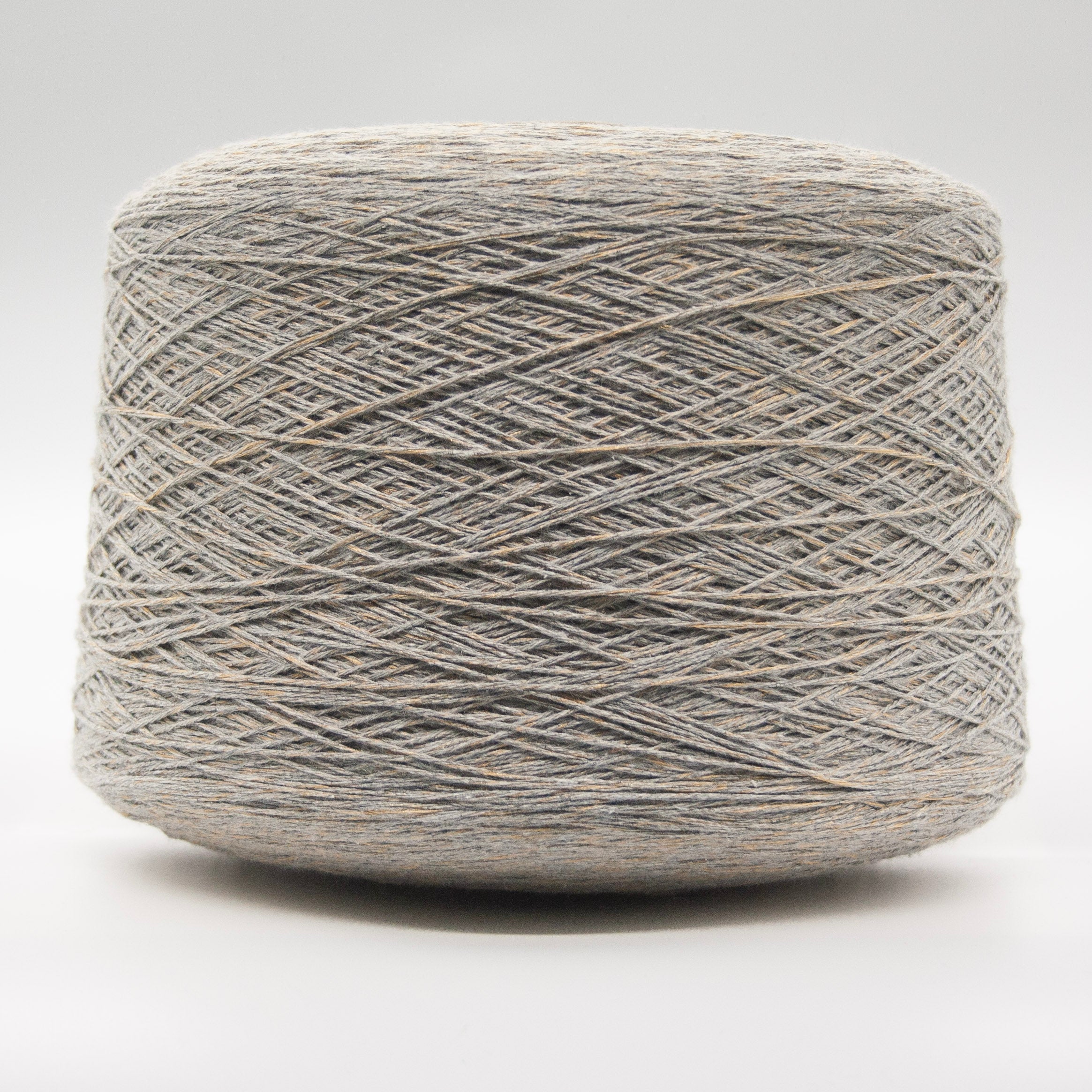 Cone of Cotton Gold yarn in Stone Gold by Filati Venezia