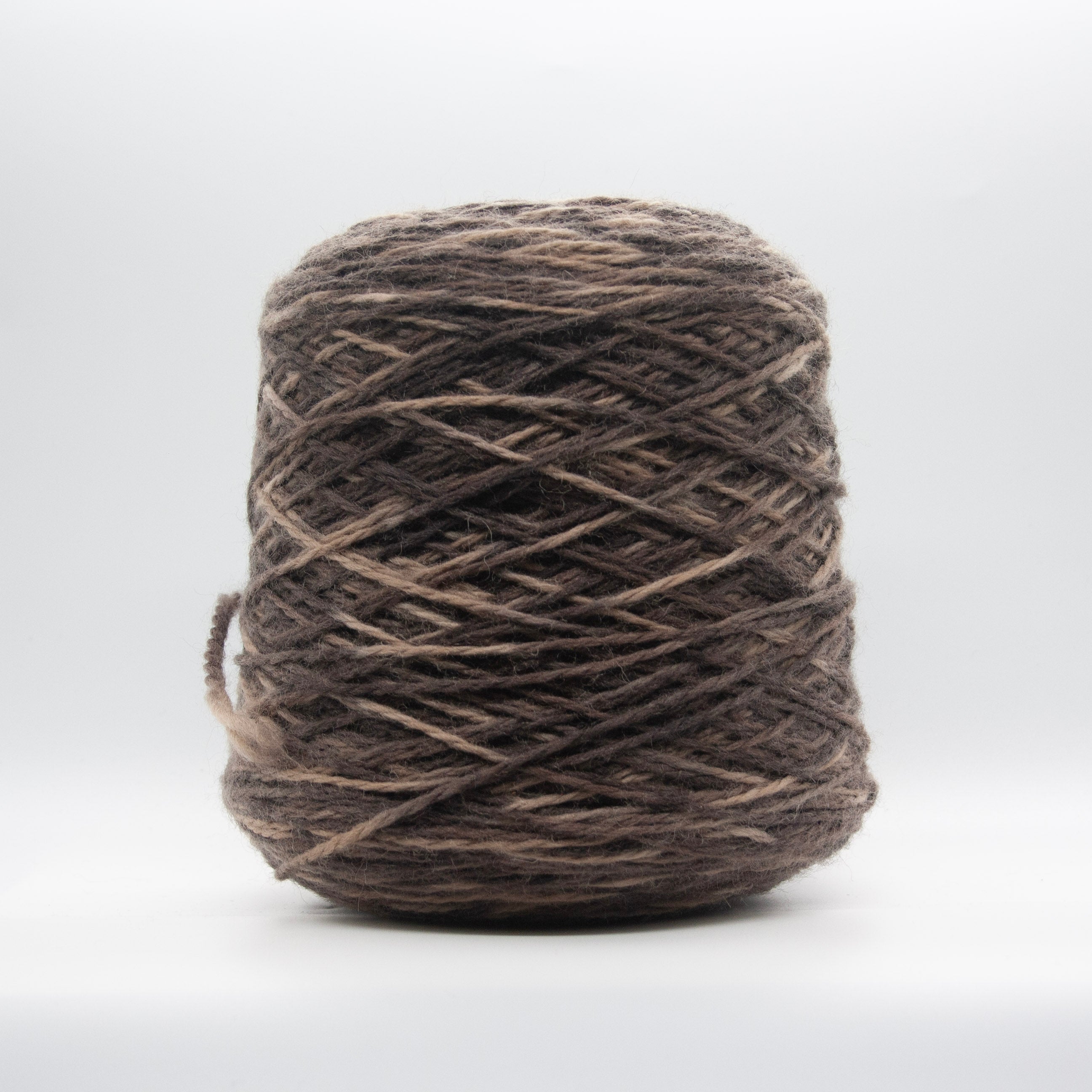 Cone of Dream yarn in Topo Melange by Filati Venezia