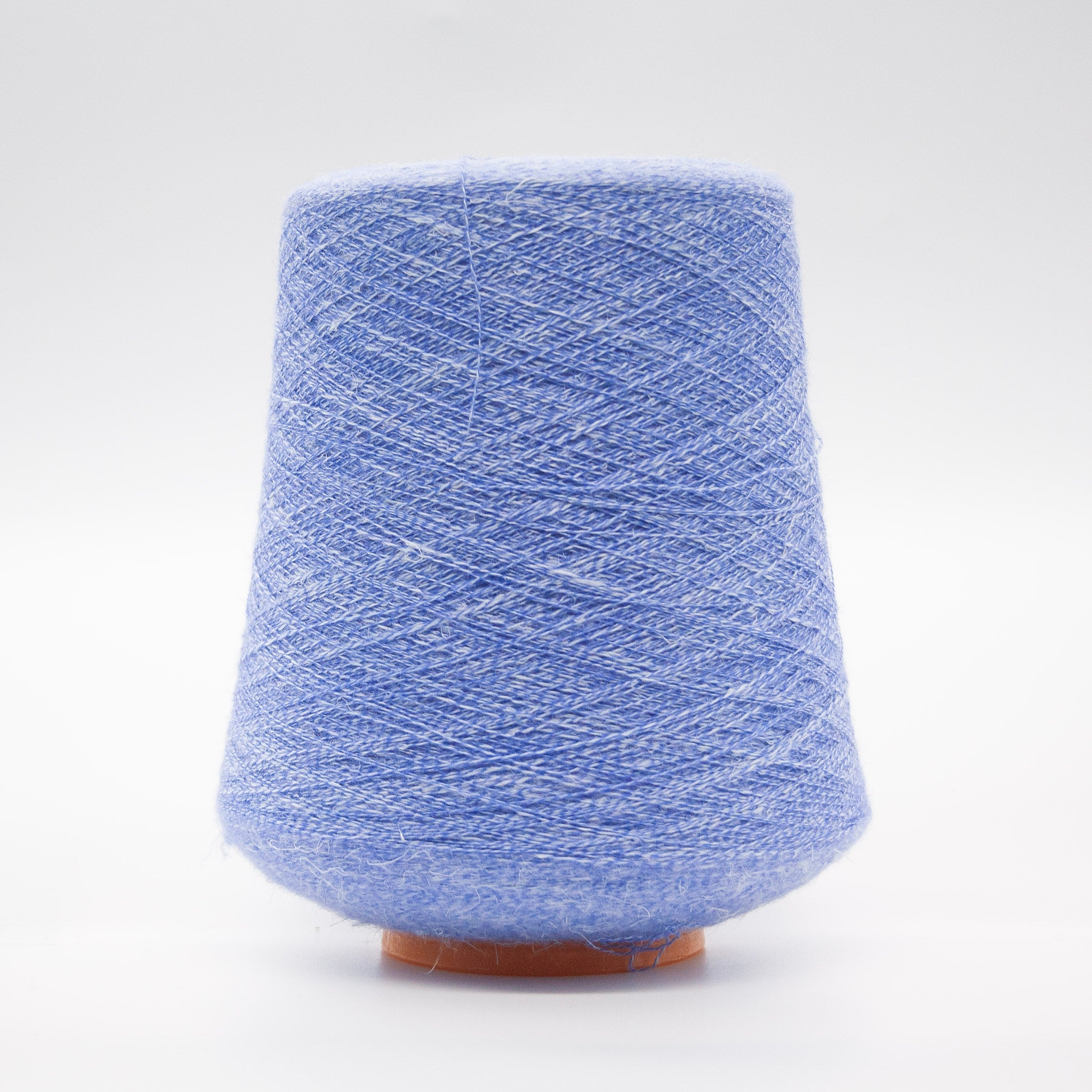 Cone of Gimko yarn in Modesto Periwinkle Mist by Filati Biagioli