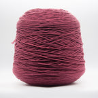 Cone of Merino Aran yarn in Melograno by Filati Venezia