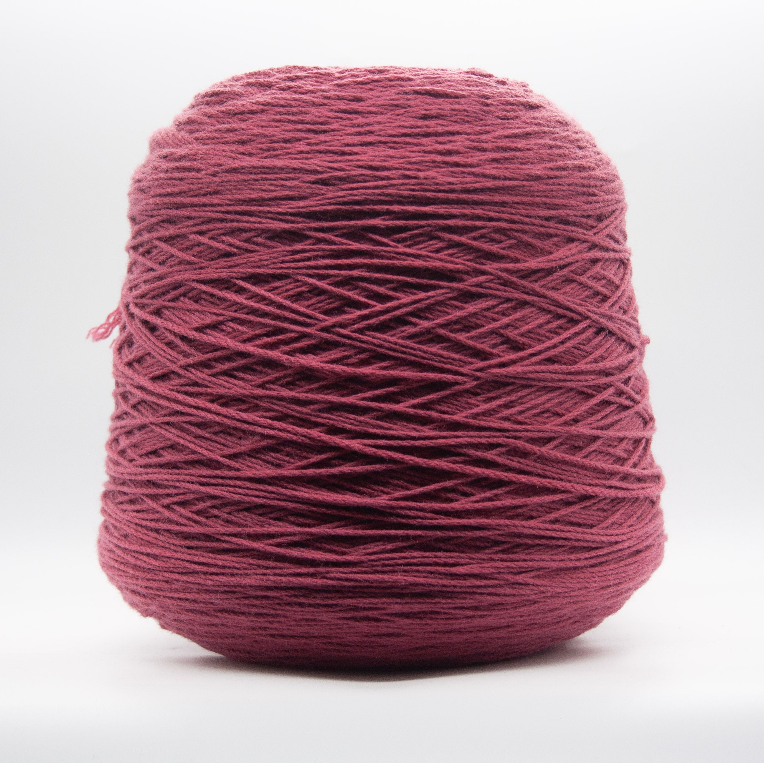 Cone of Merino Aran yarn in Melograno by Filati Venezia