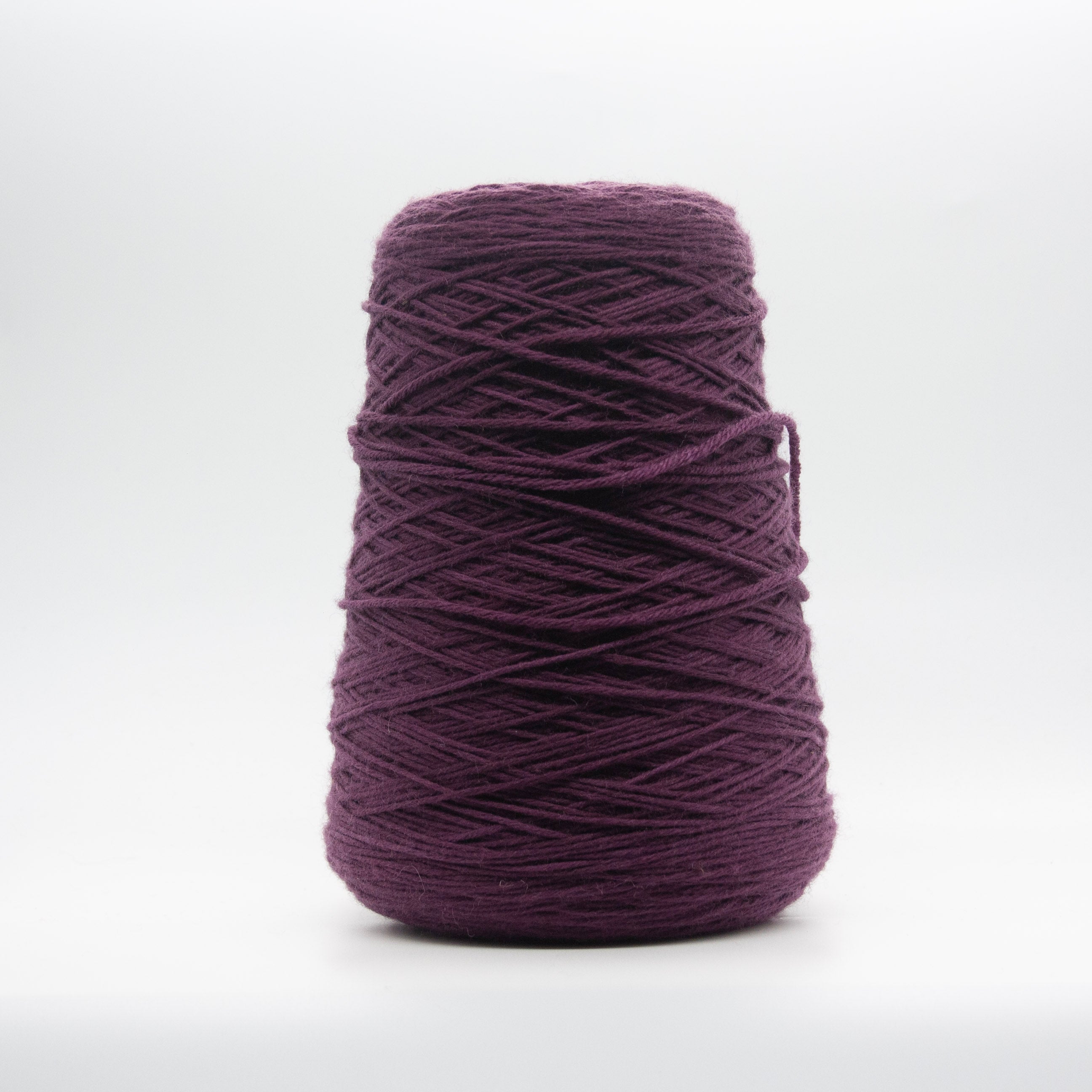 Cone of Merino Grosso 2250 yarn in Fico Nero by Filati Venezia