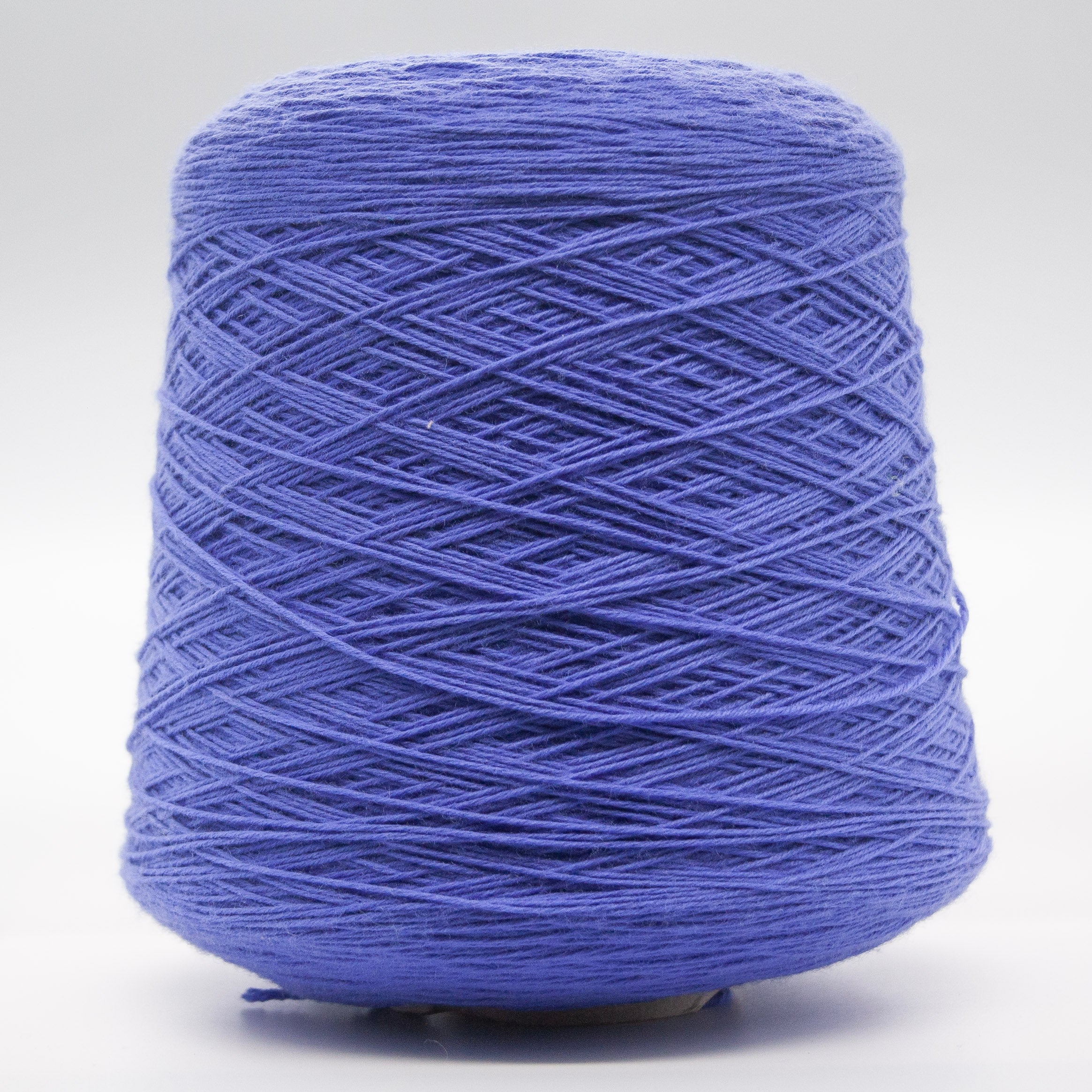 Cone of Merinoull yarn in Blue Iris by Filati Venezia