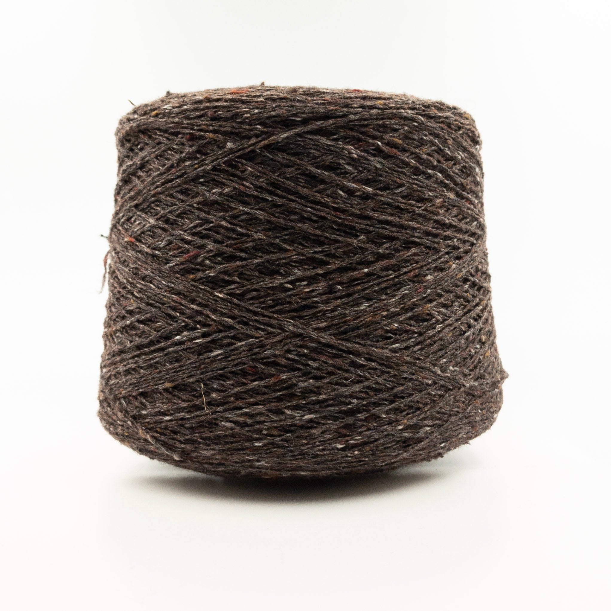 Cone of Monviso Tweed yarn in Castagna by Millefili Marrone