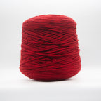 Cone of Pirenei Aran yarn in Rosso Cremisi by Filati Venezia