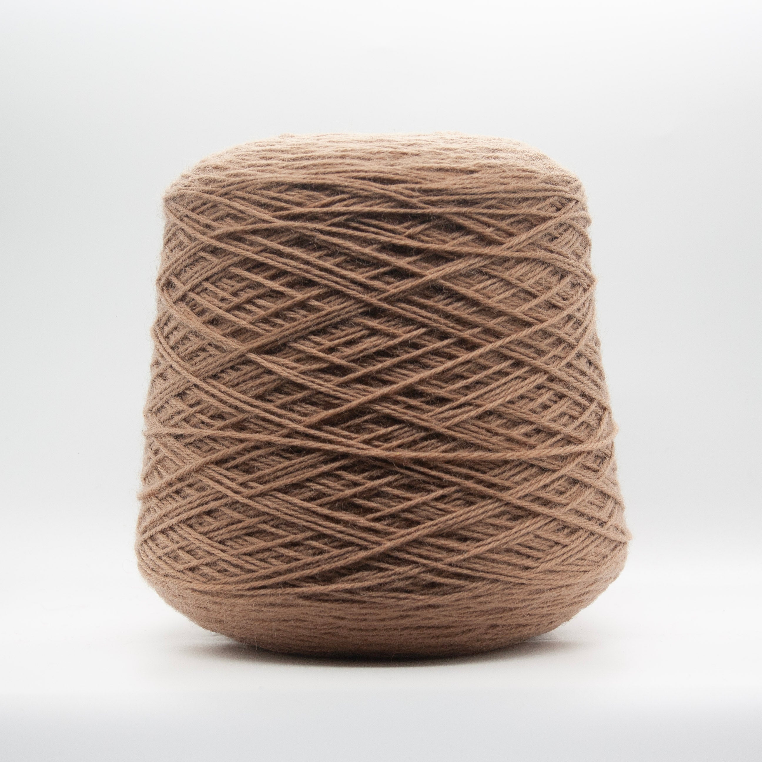 Cone of Pirenei Fingering yarn in Indian Tan by Filati Venezia