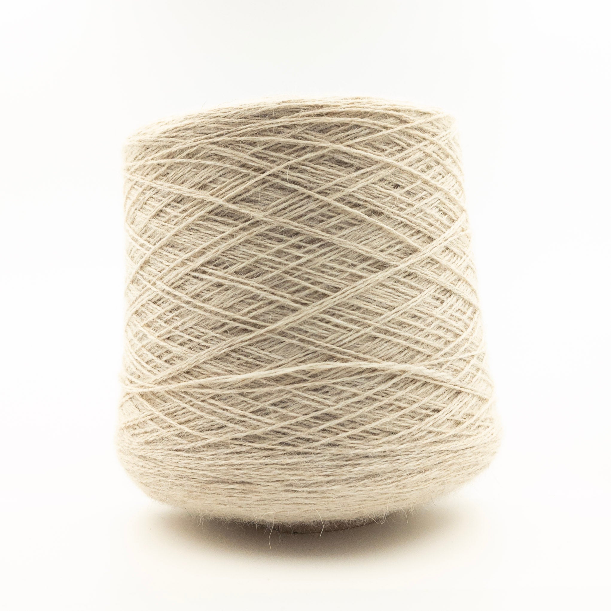 Cone of Renegade yarn in Chiaro by Olimpias Burro