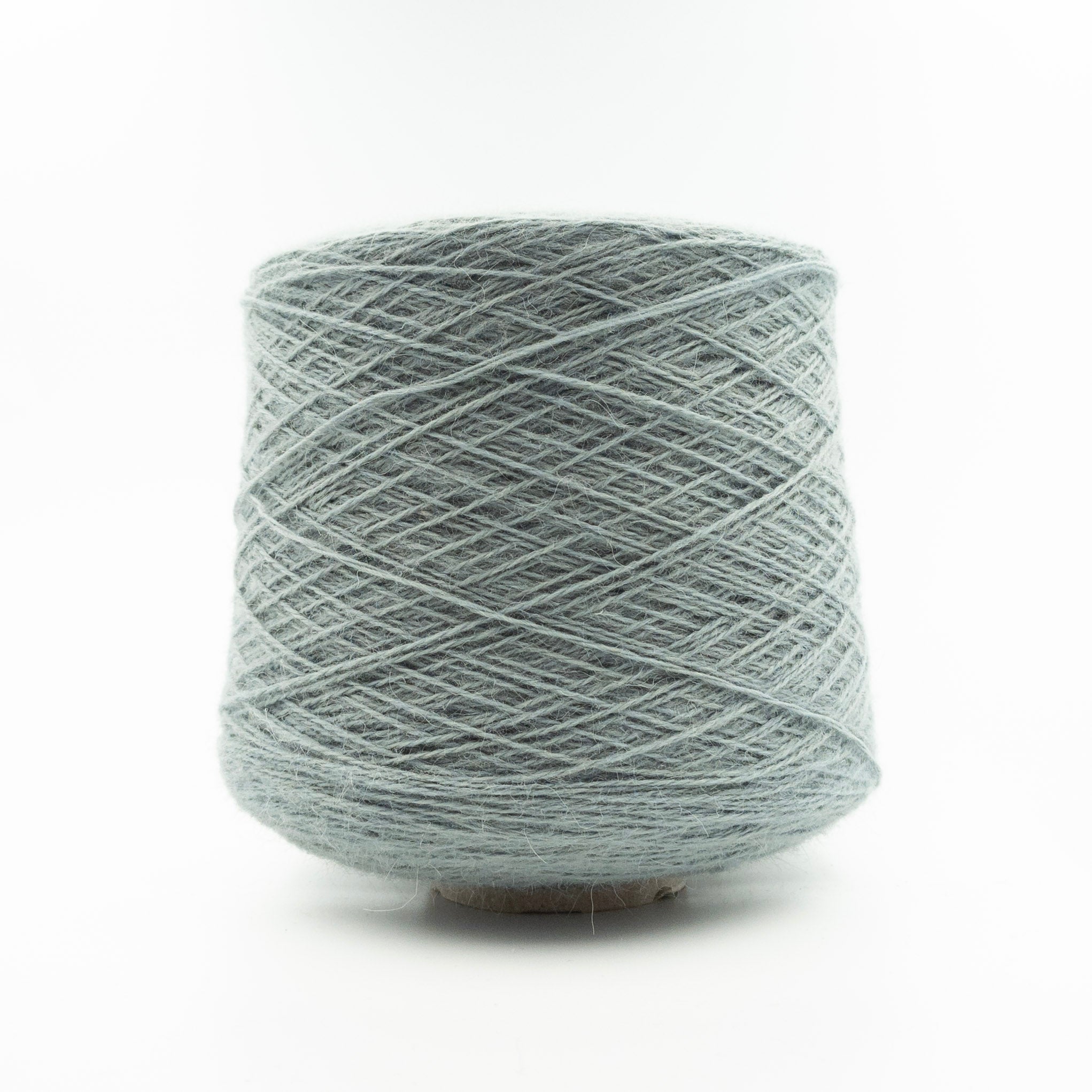 Cone of Renegade yarn in Pallido by Olimpias Eucalipto