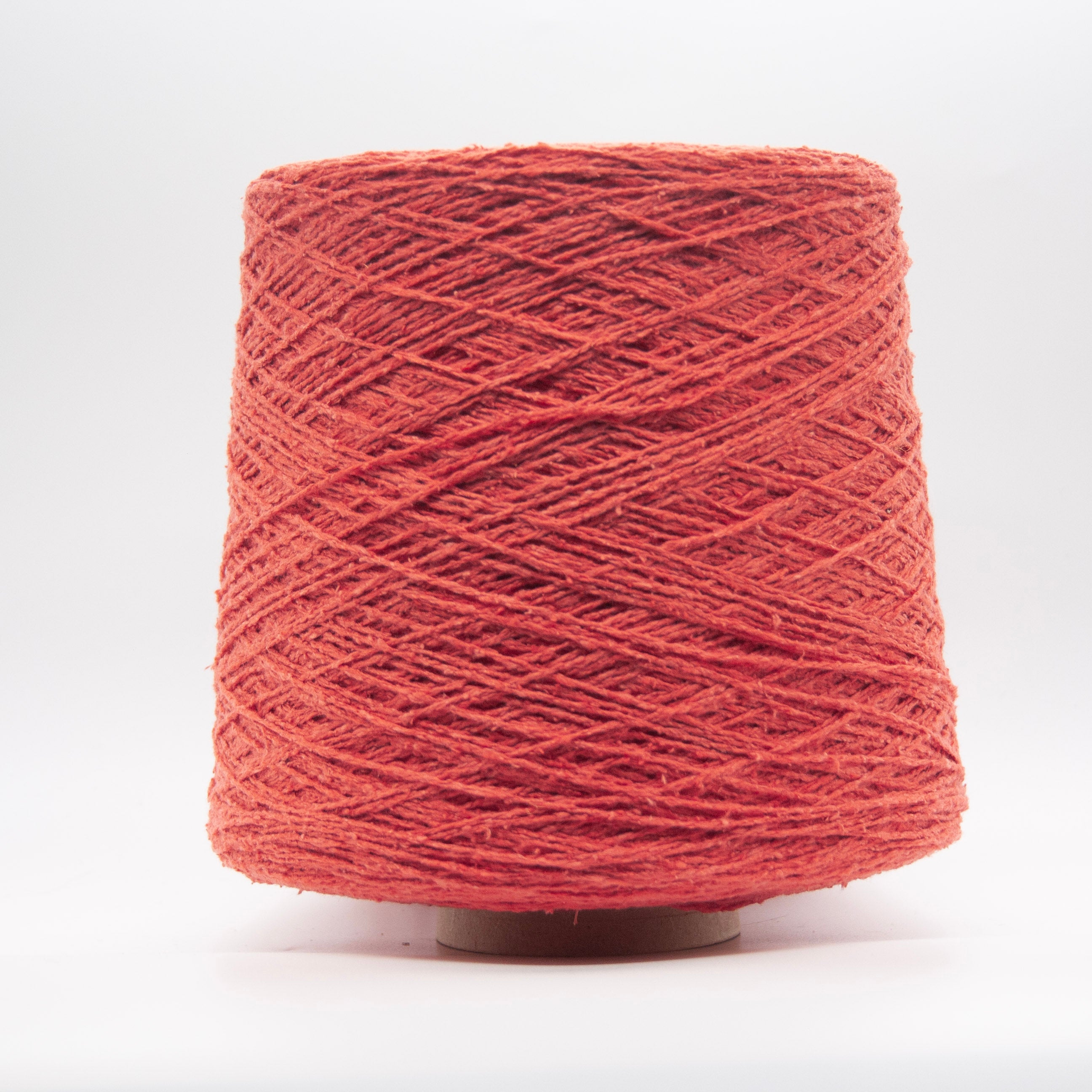 Cone of Seta Bourette yarn in Corallo Rosa by Filati Venezia
