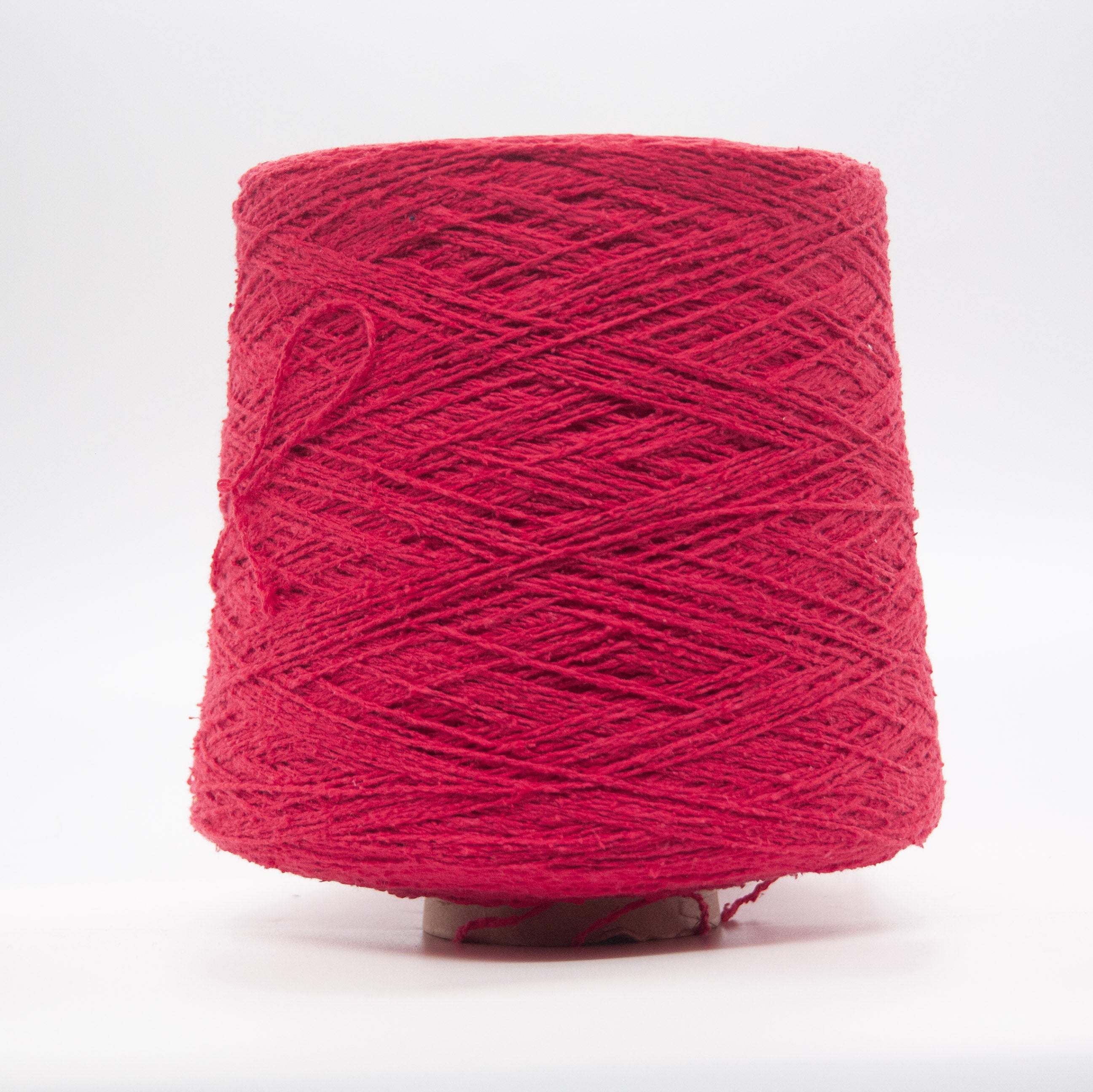 Cone of Seta Bourette yarn in Lampone Nero by Filati Venezia