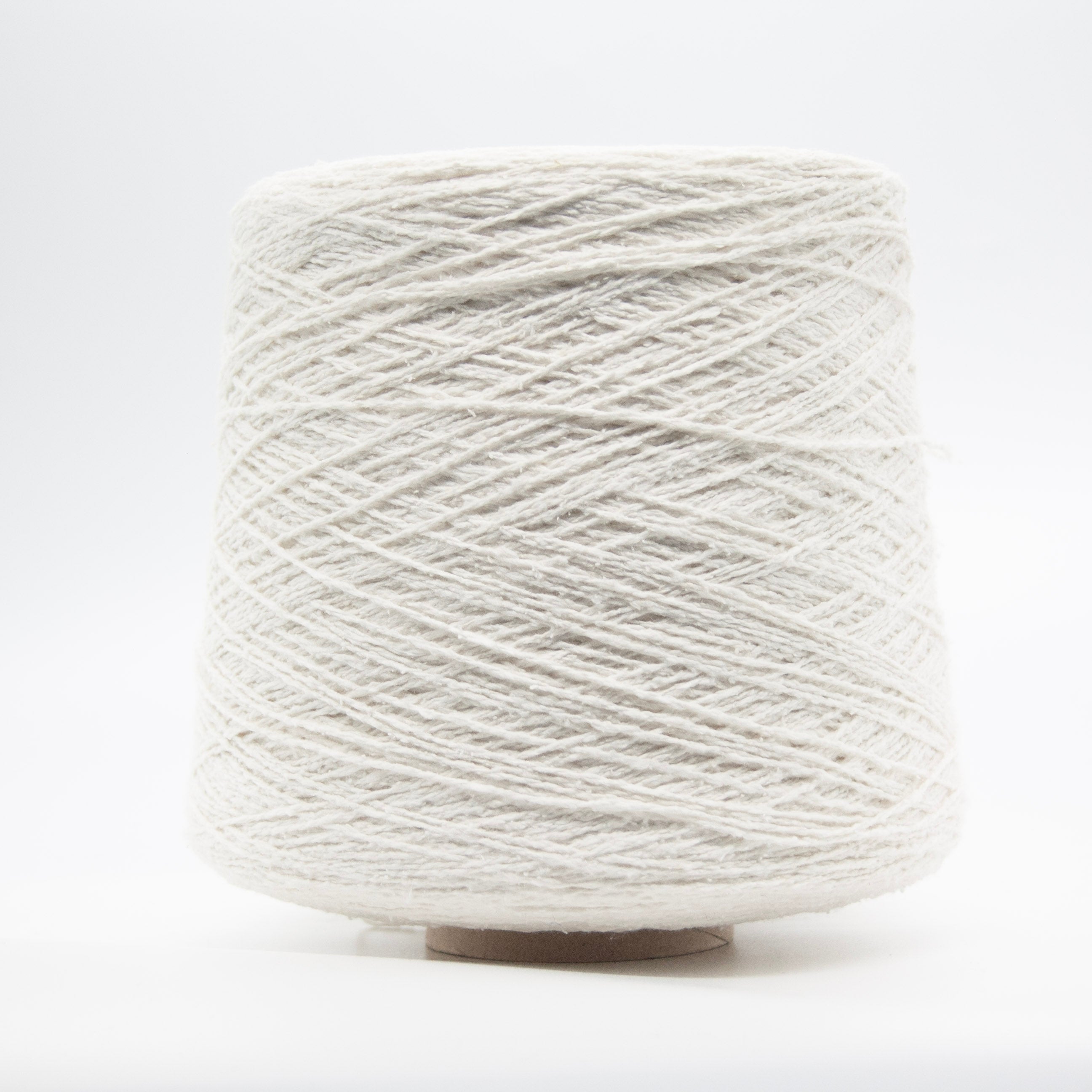 Cone of Seta Bourette yarn in Neve Alpina by Filati Venezia