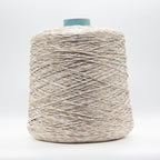 Cone of Seta Schappe yarn in Avena Melange by Filati Venezia