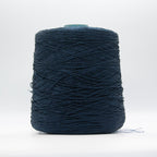 Cone of Seta Schappe yarn in Blu Classico by Filati Venezia