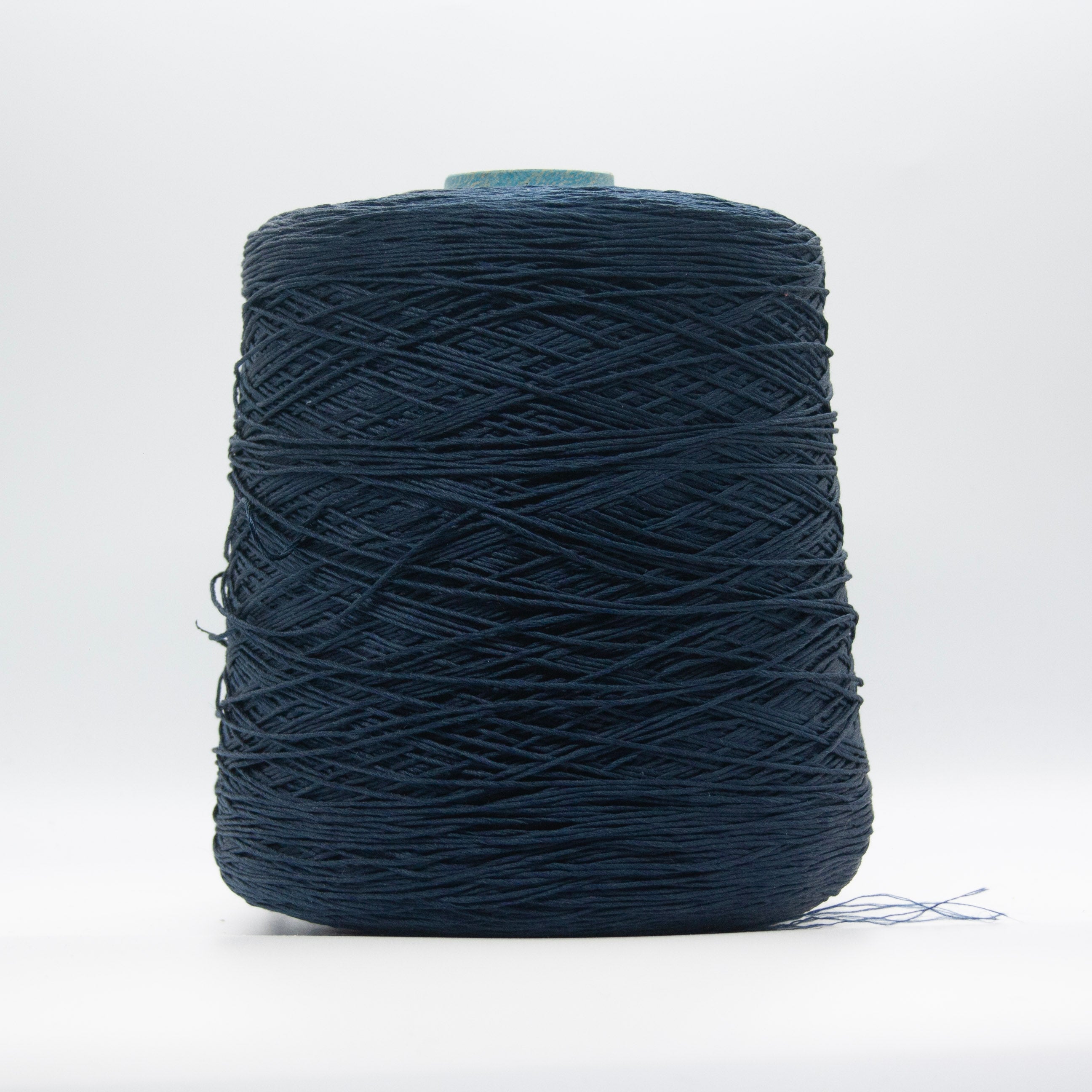 Cone of Seta Schappe yarn in Blu Classico by Filati Venezia