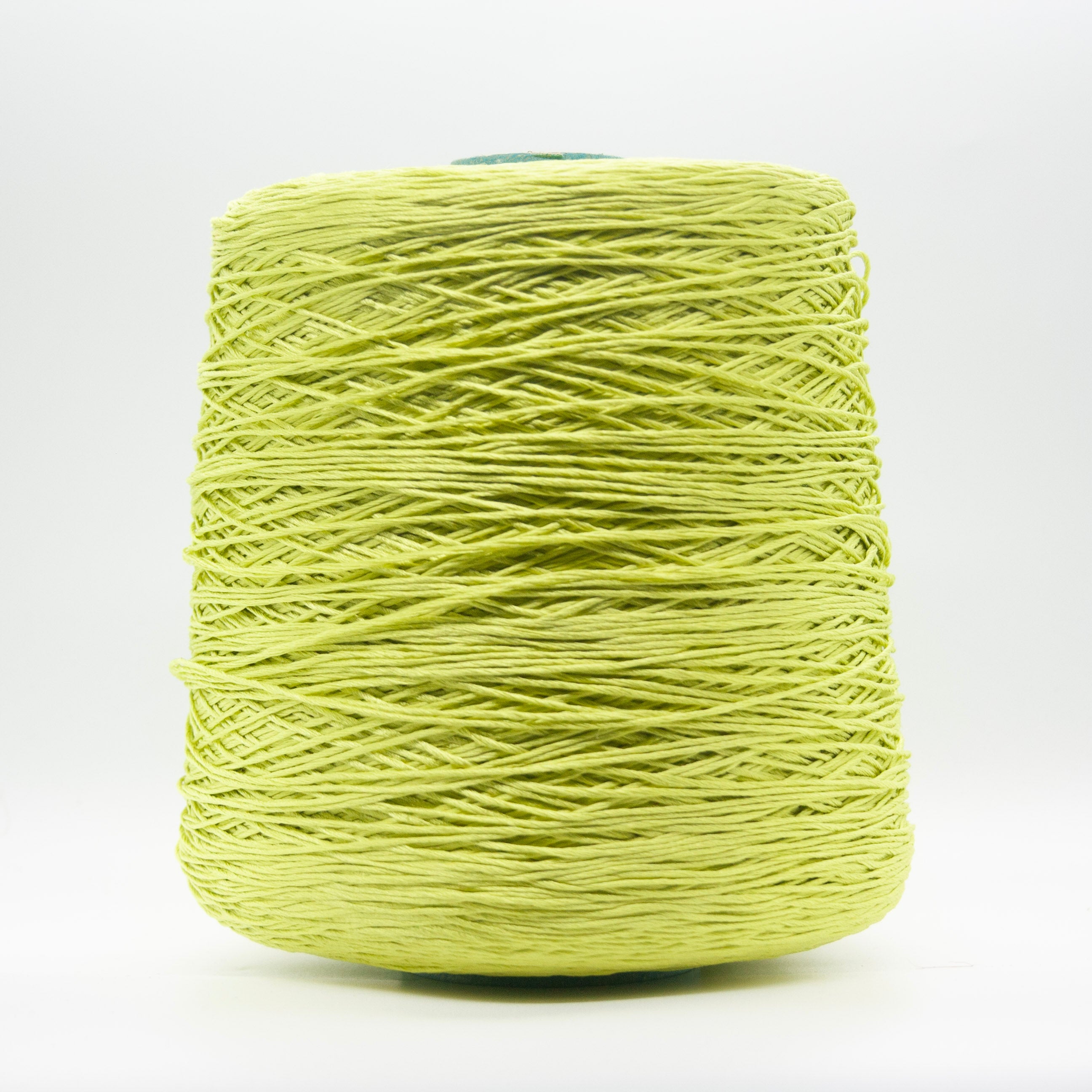 Cone of Seta Schappe yarn in Cedro Lime by Filati Venezia