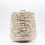 Cone of Seta Schappe yarn in Crema Antica by Filati Venezia