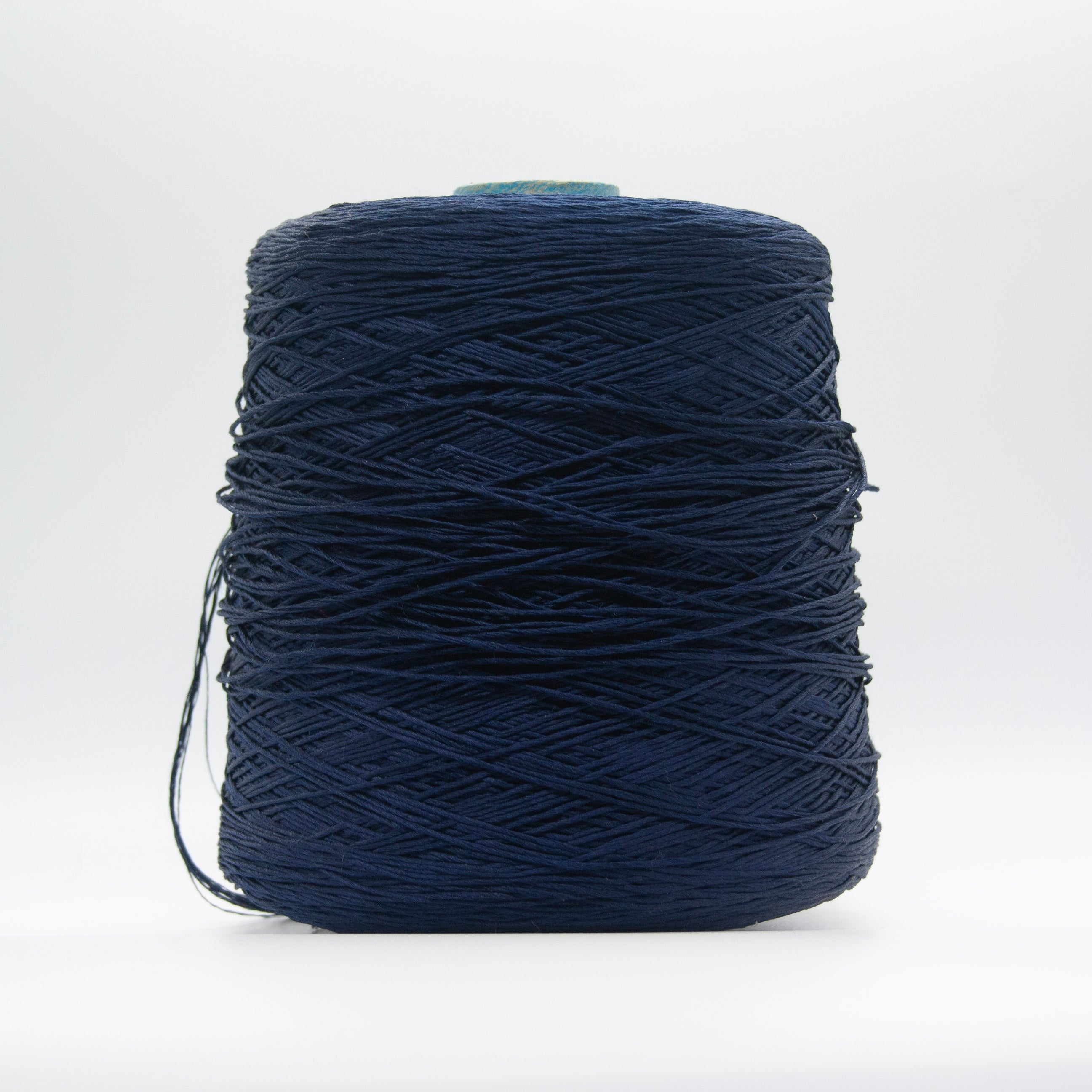 Cone of Seta Schappe yarn in Oceano Scuro by Filati Venezia