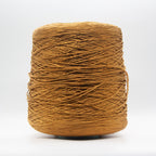 Cone of Seta Schappe yarn in Zafferano Oro by Filati Venezia