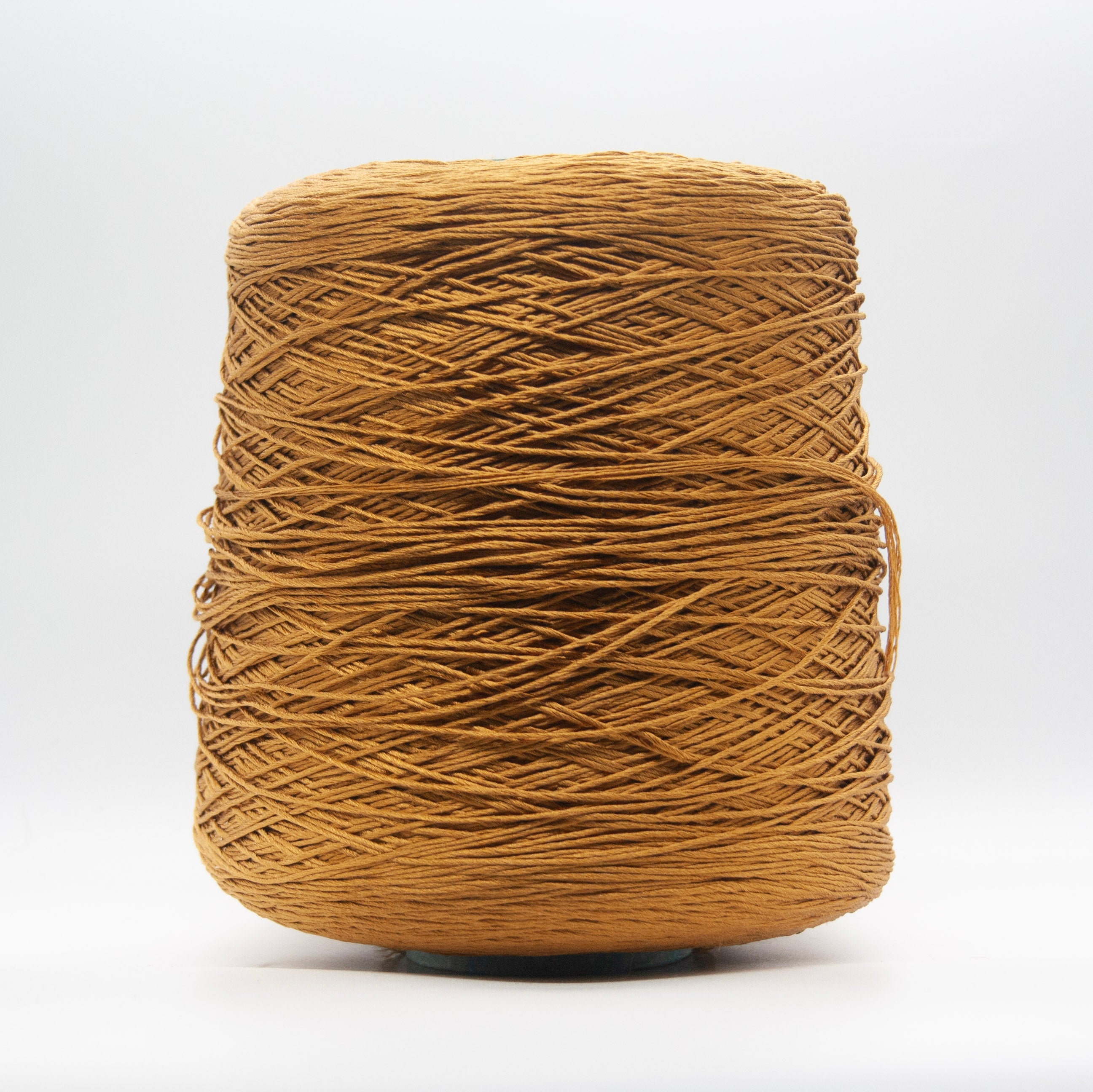 Cone of Seta Schappe yarn in Zafferano Oro by Filati Venezia