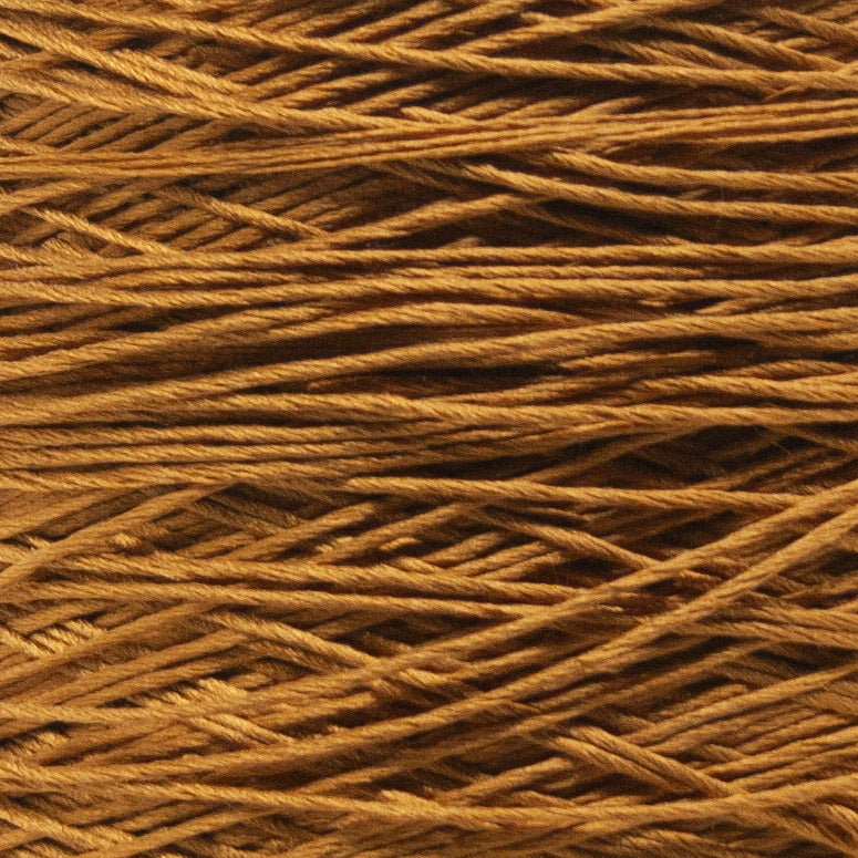 Close up of Seta Schappe by Filati Venezia – Zafferano Oro