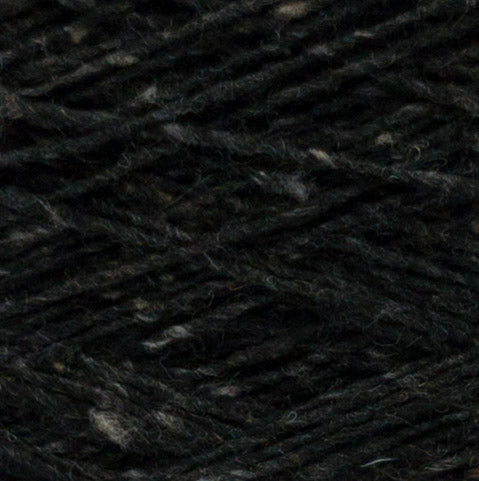 Close up of Seventyfive Donegal by Filpucci Black – Tweed