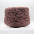 Cone of Slubby Green yarn in Brandy Sniffer by Filati Venezia
