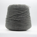 Cone of Slubby Green yarn in Neutral Grey by Filati Venezia