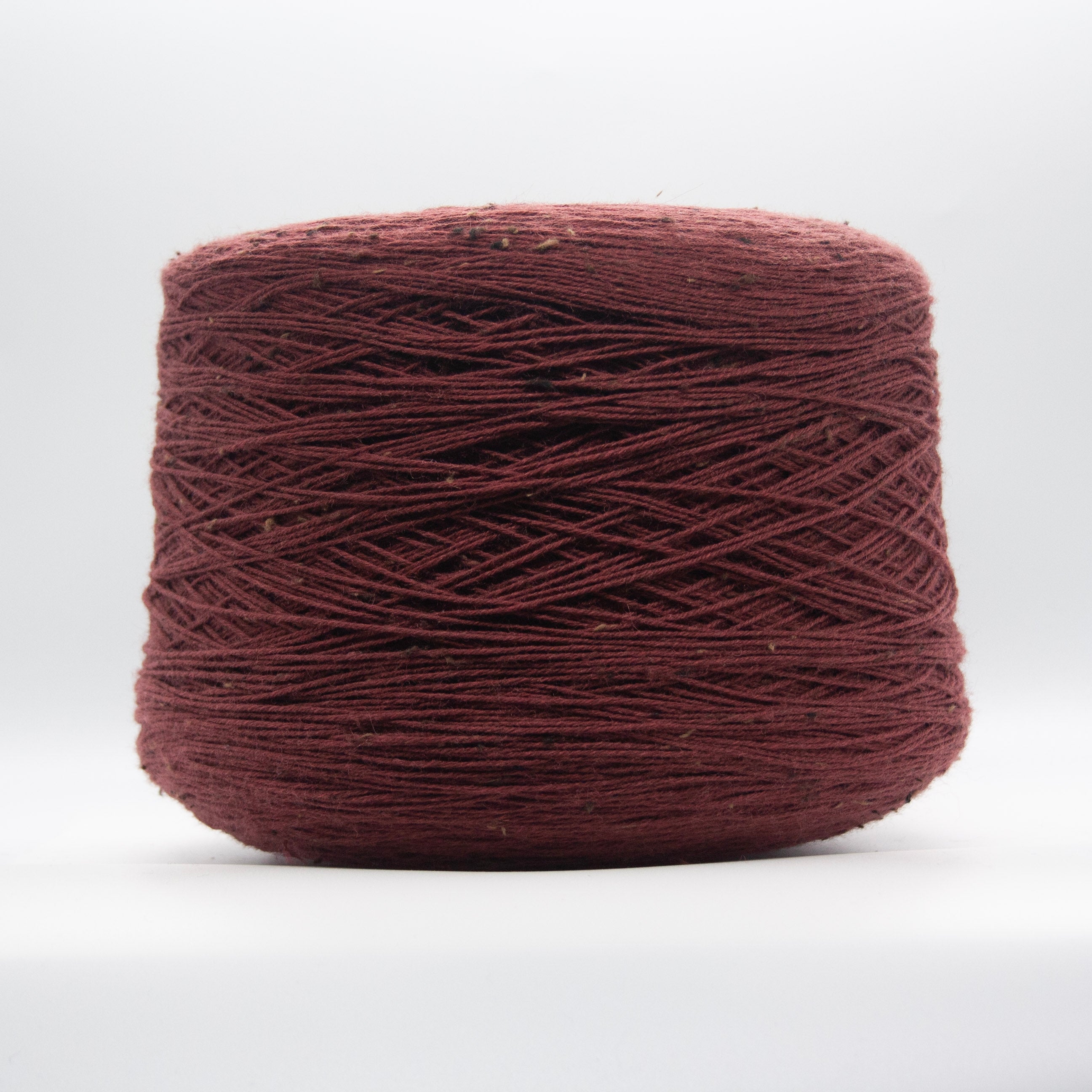 Cone of Slubby Green yarn in Nostalgic Rose by Filati Venezia