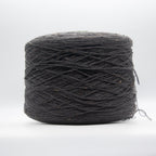 Cone of Slubby Green yarn in Smoked Pearl by Filati Venezia