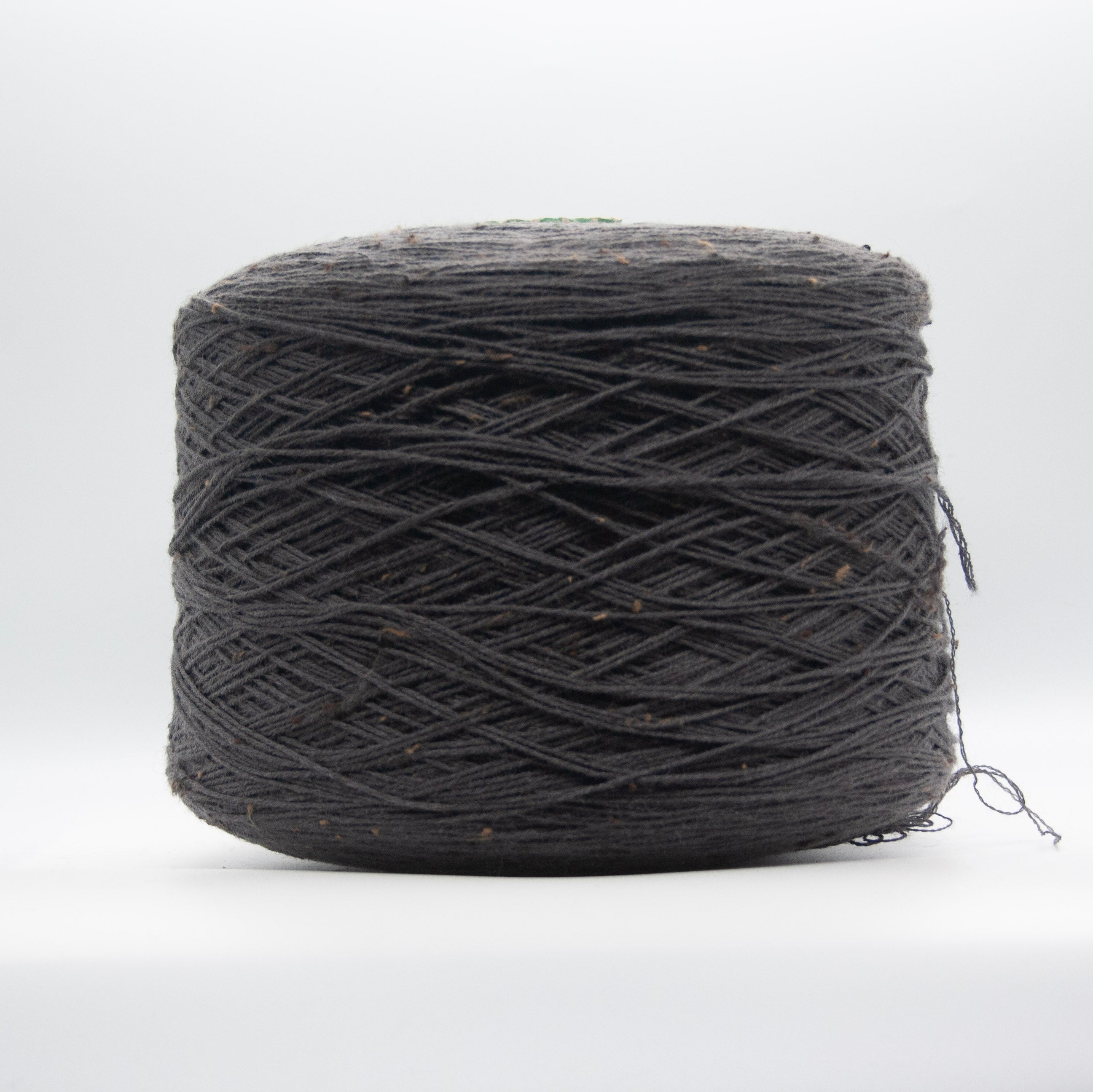 Cone of Slubby Green yarn in Smoked Pearl by Filati Venezia