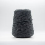 Cone of Sogno yarn in Dark Grey Melange by Filati Venezia