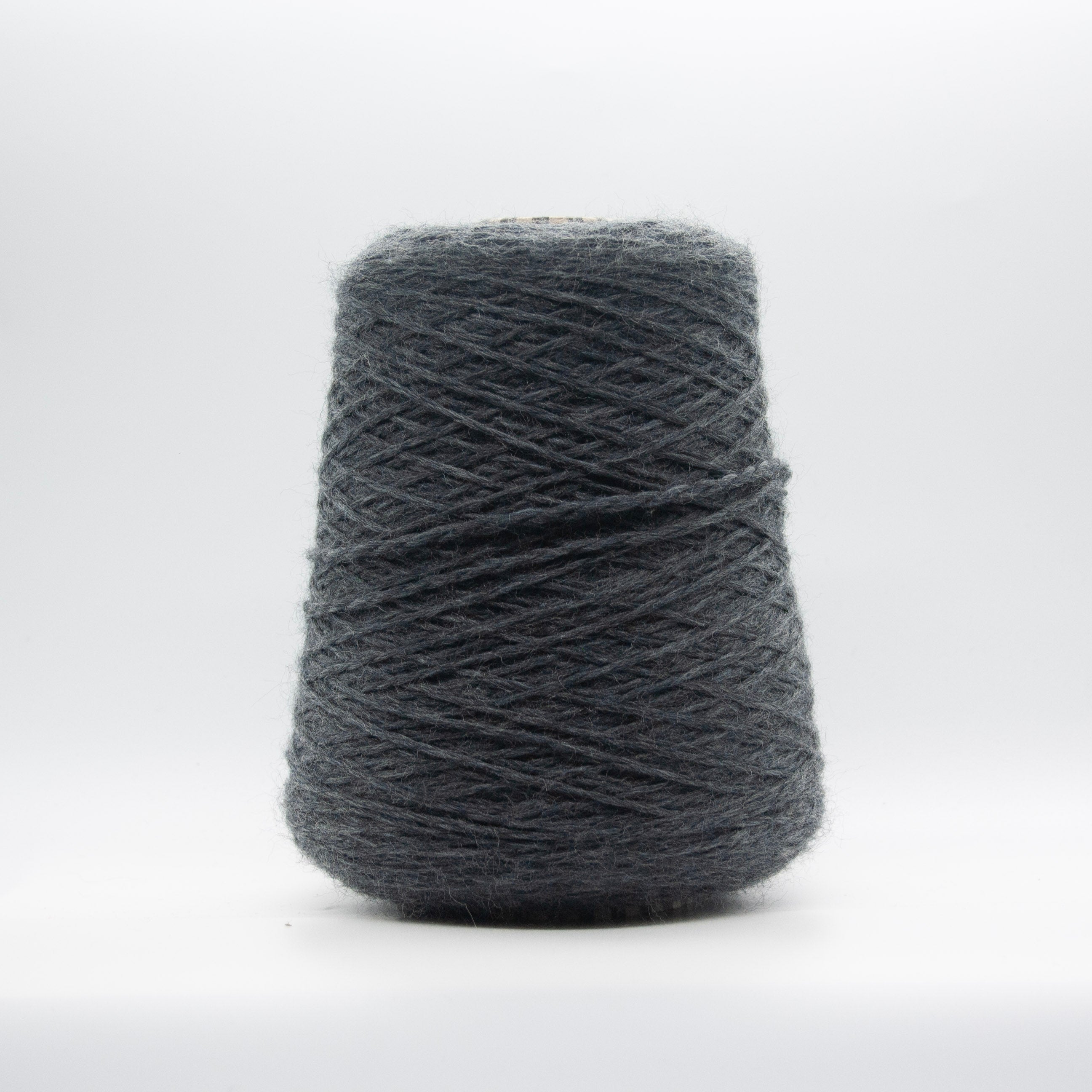 Cone of Sogno yarn in Dark Grey Melange by Filati Venezia