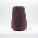 Cone of Somerset yarn in Damson Velvet by Suedwolle Group