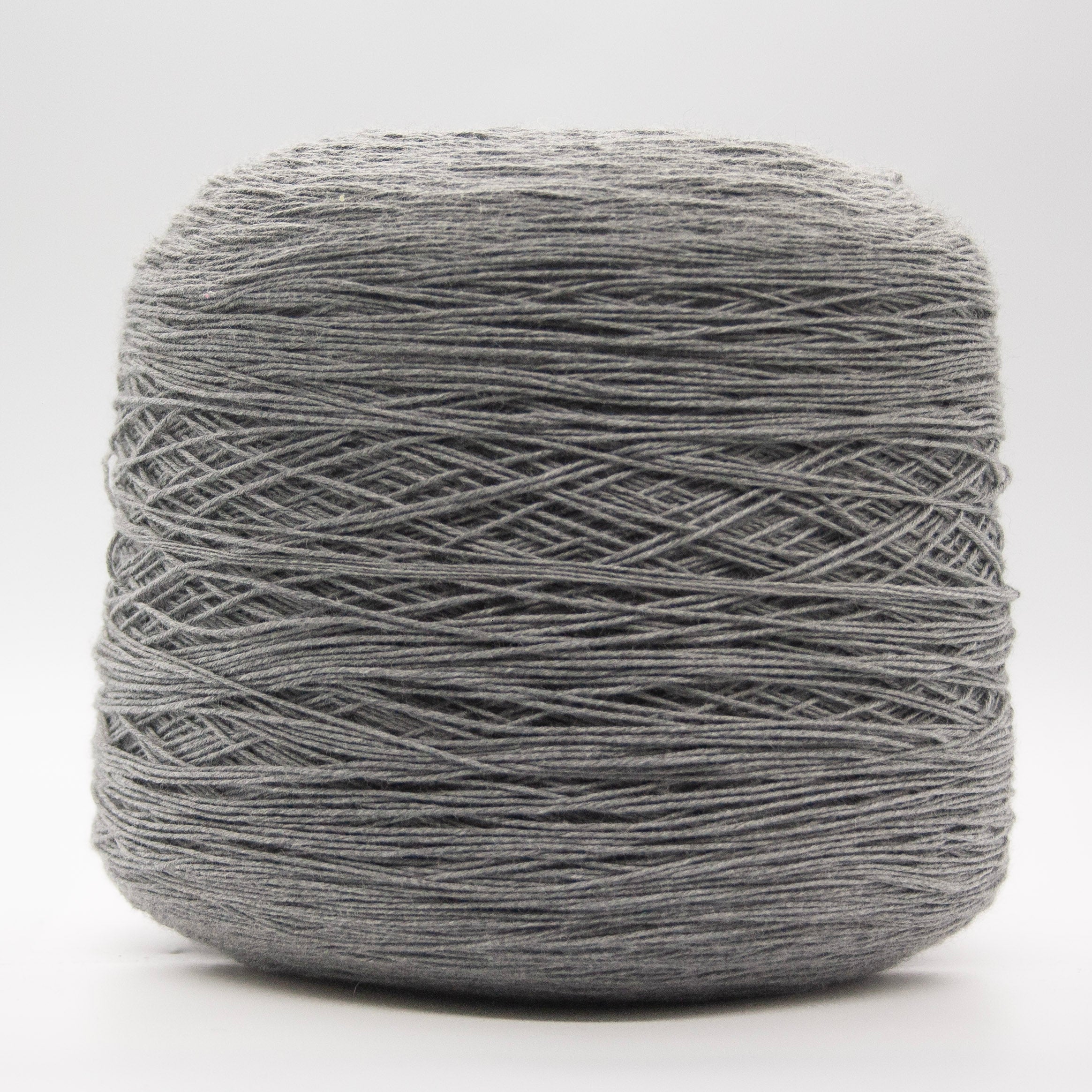 Cone of Somerset yarn in Grigio Fumo by Suedwolle Group