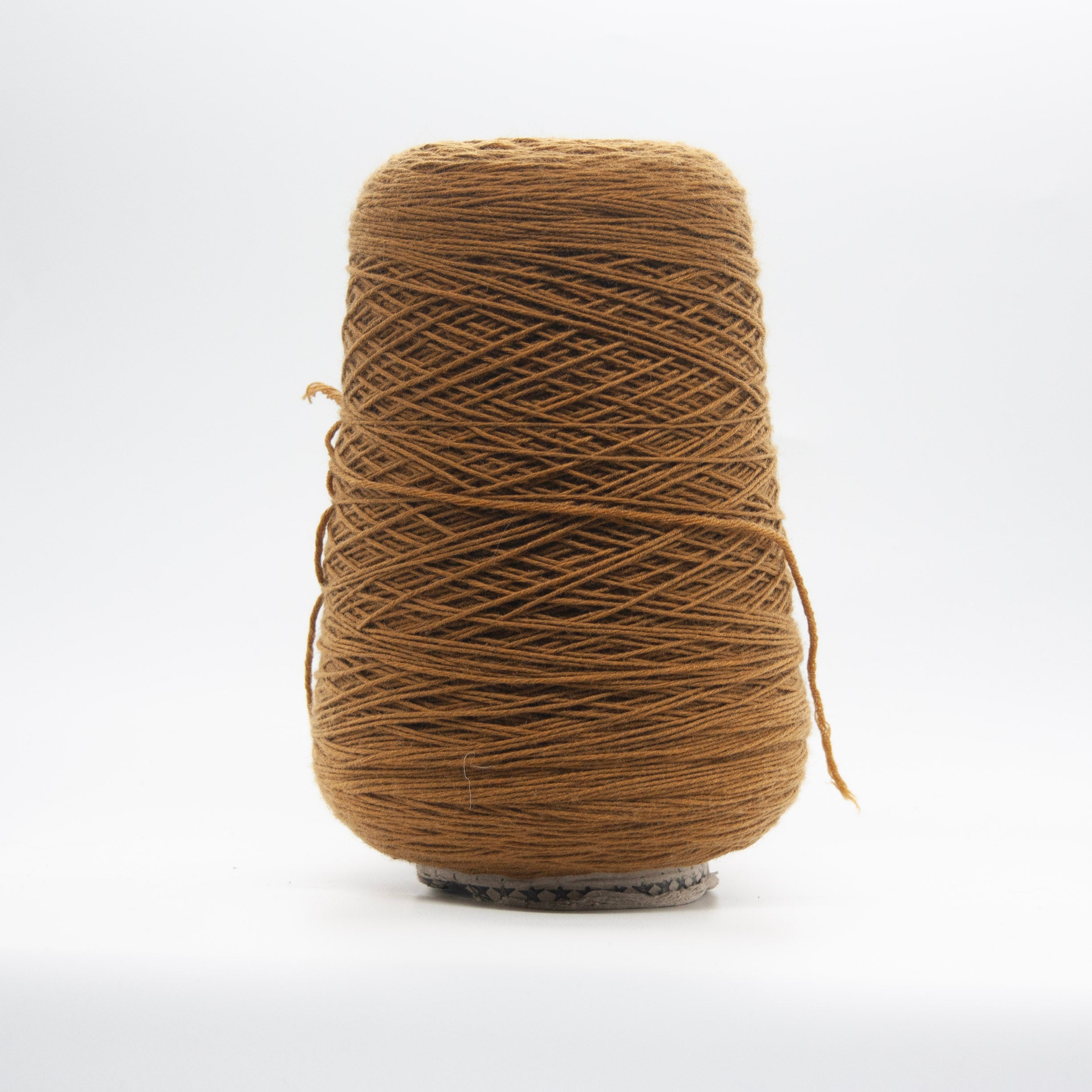 Cone of Somerset yarn in Toasted Caramel by Suedwolle Group
