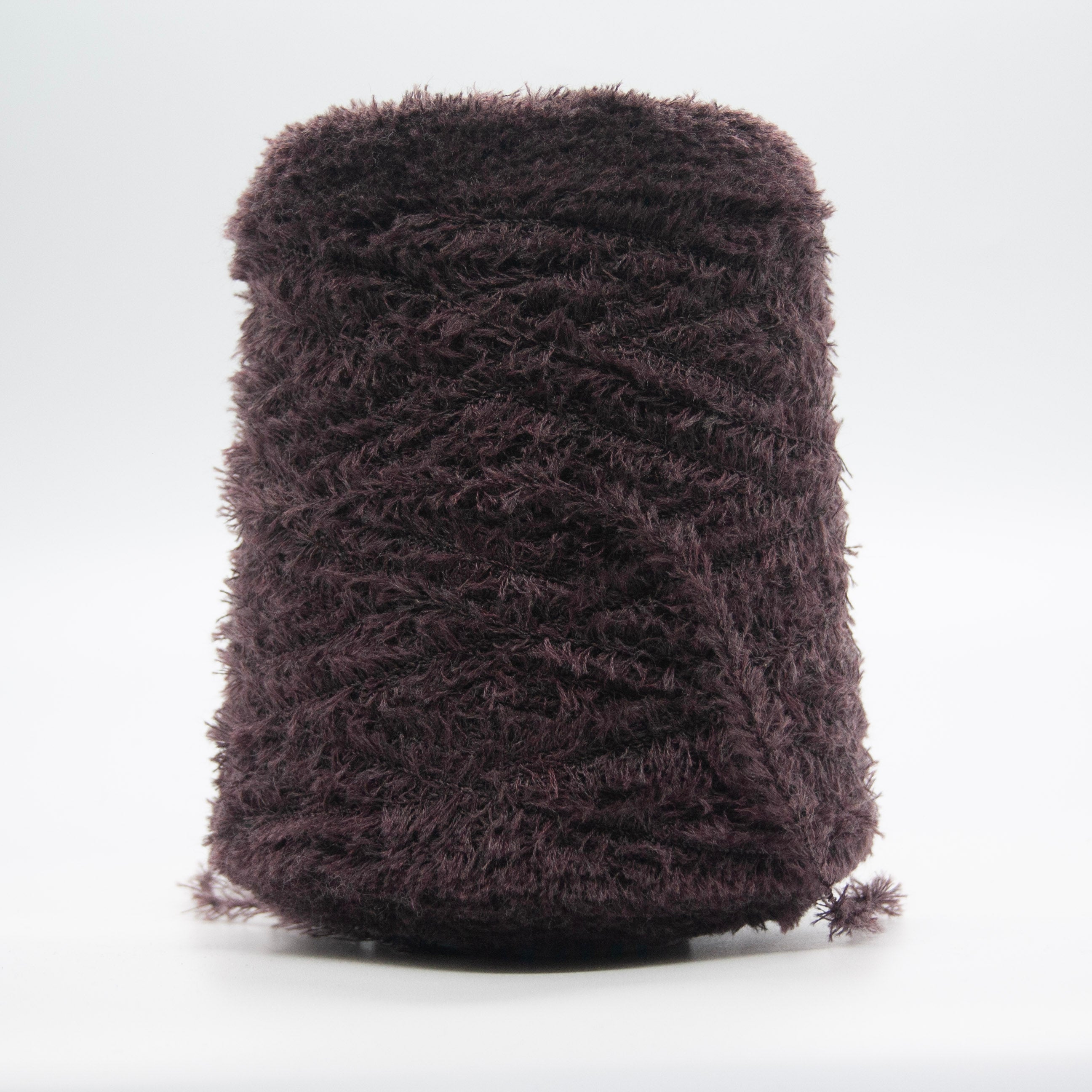 Cone of Tagliatino Merino yarn in Arancia Bruciata by Filati Venezia