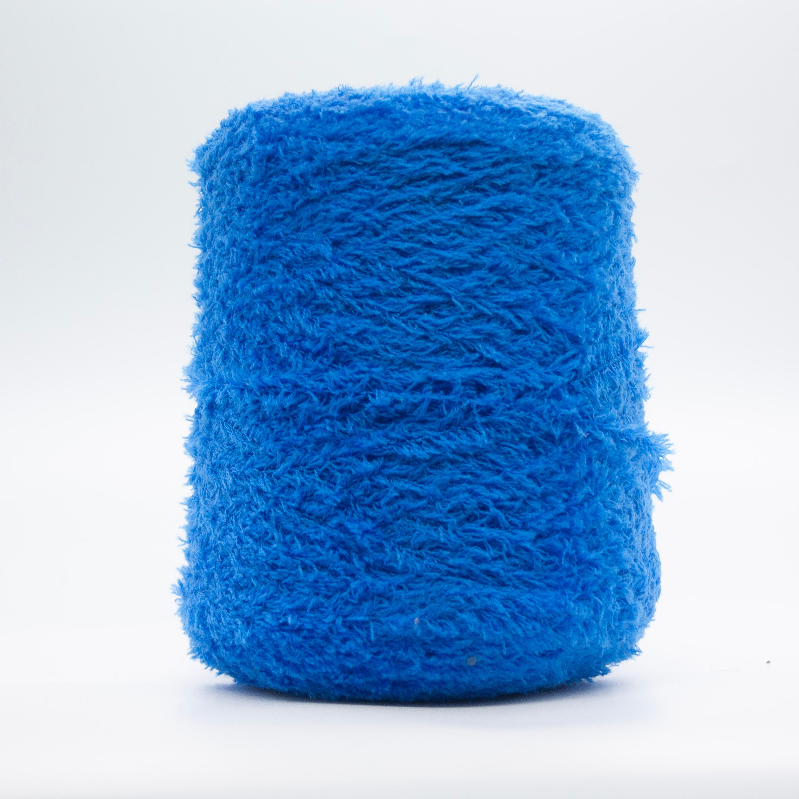 Cone of Tagliatino Merino yarn in Azzurro Capri by Filati Venezia